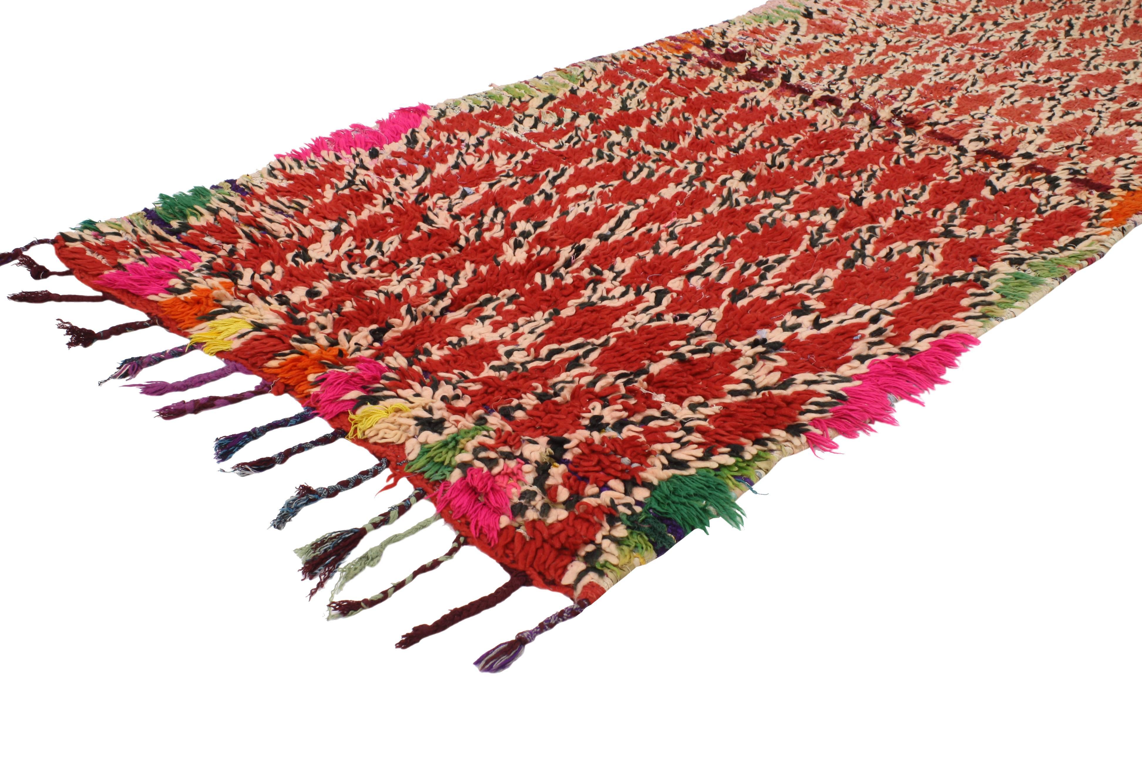 20390 Vintage Berber Moroccan Runner with Tribal Style, Shag Hallway Runner. This hand knotted wool vintage Berber Moroccan runner features an all-over diamond lattice pattern spread across an abrashed red field. The stark contrast of sandy-beige