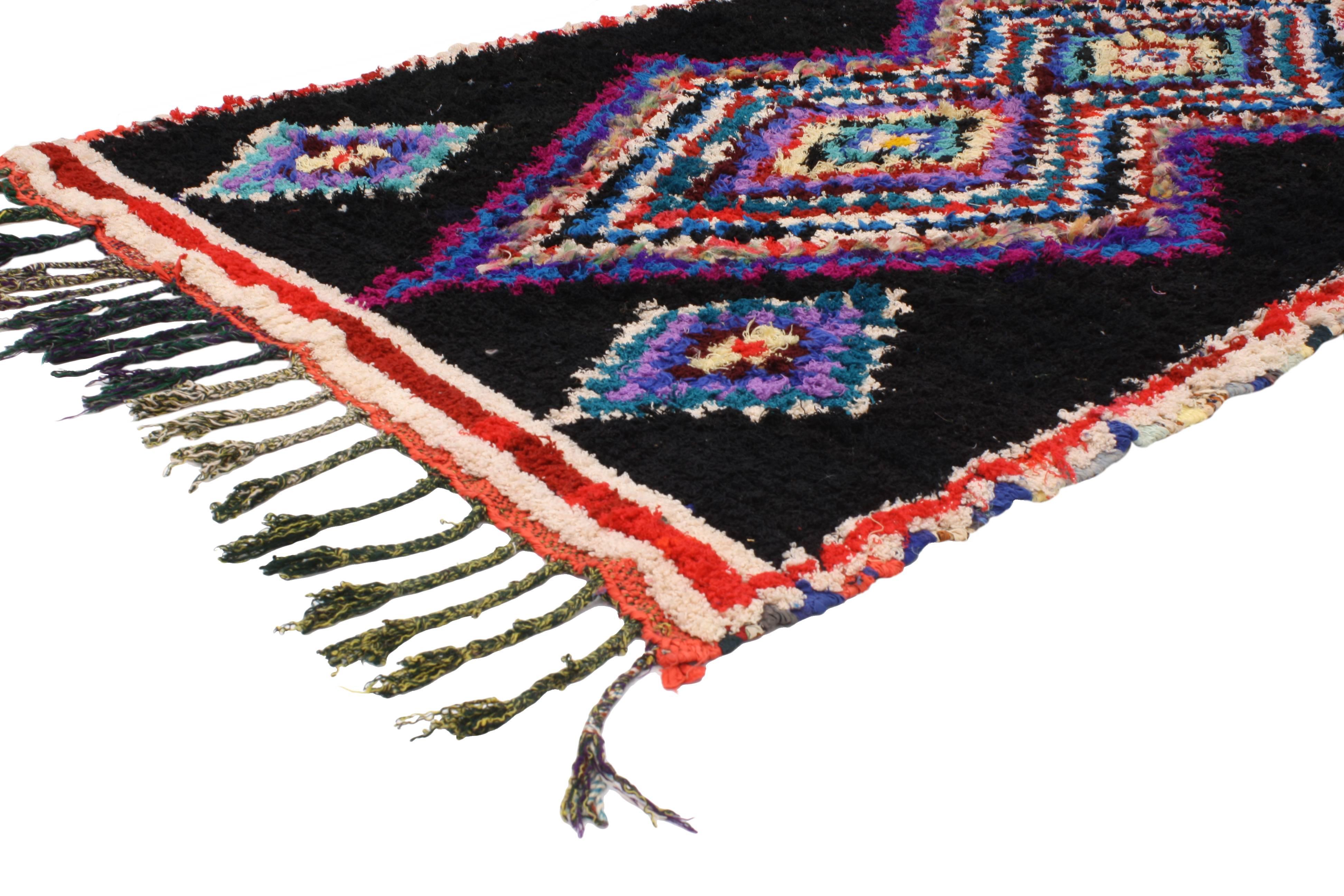 20442 Vintage Berber Moroccan Rug with Boho Chic Tribal Style 04'06 x 07'01. This hand-knotted wool  vintage Berber Moroccan rug features two large-scale stacked concentric diamond lozenges creating an expansion effect on the abrashed black field. A