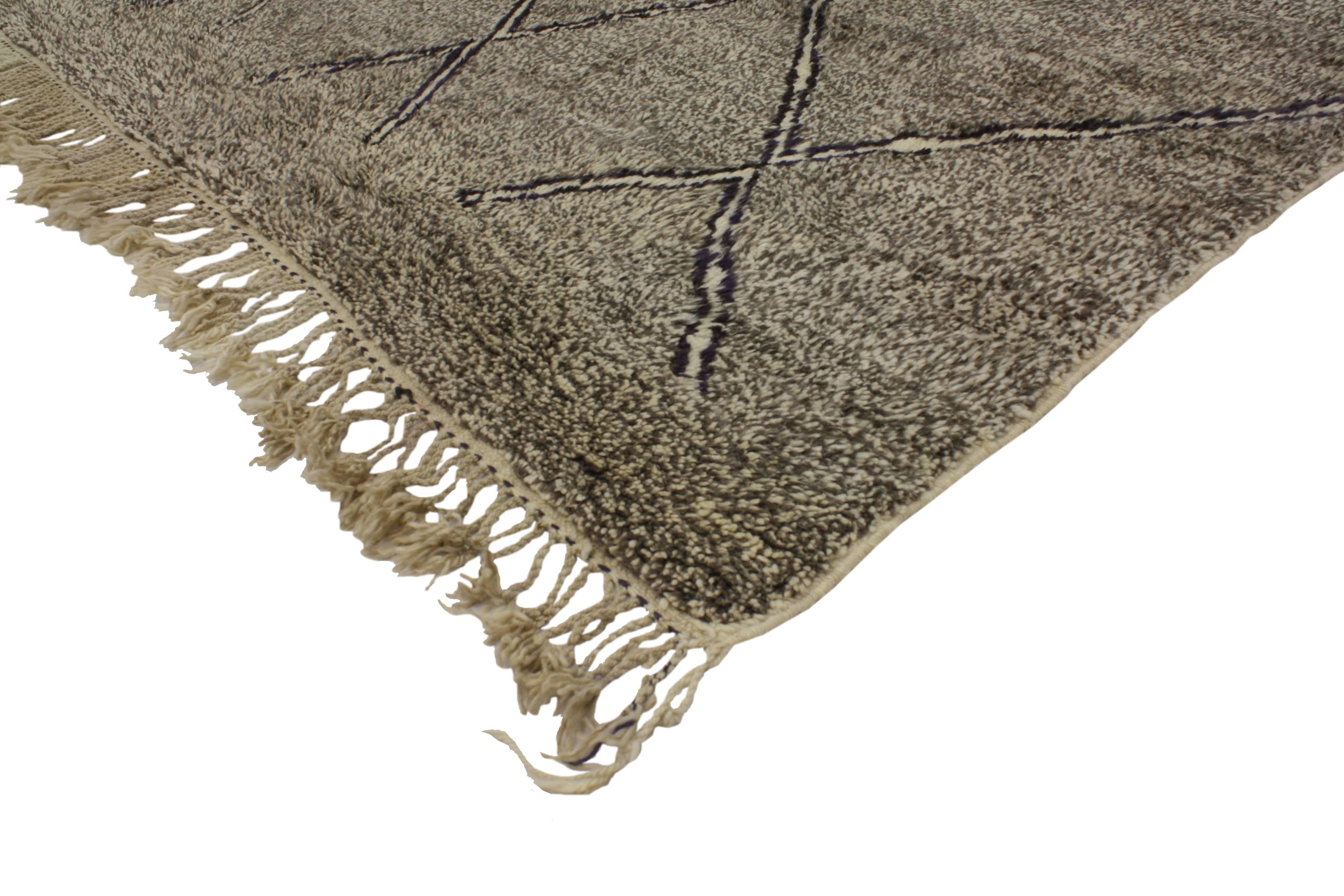 Impeccable craftsmanship and modern style, this taupe Berber Moroccan rug is Classic and a beautiful balance of warm and cool. The high-contrast combined with its plush wool complement the trending style. Featuring a neutral color palette of