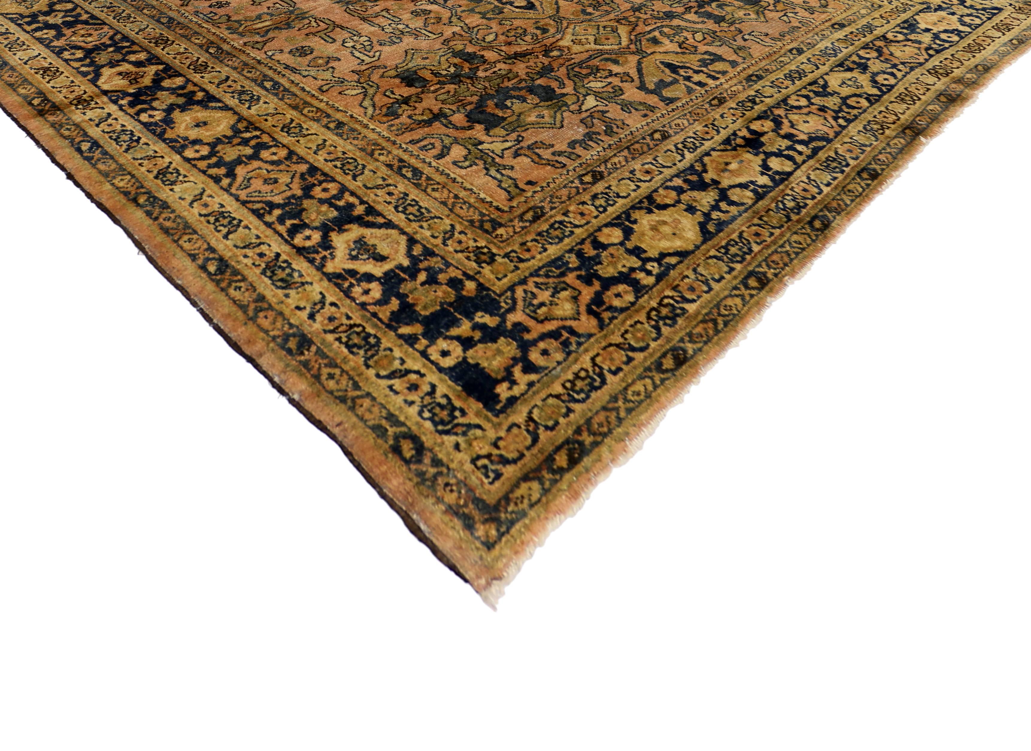 Highly cultivated in design, this vintage Mahal Persian rug highlights a modern traditional style. Featuring a timeless and Classic Persian design resulting in an exceptionally graceful and balanced composition. Full of character and cleverly