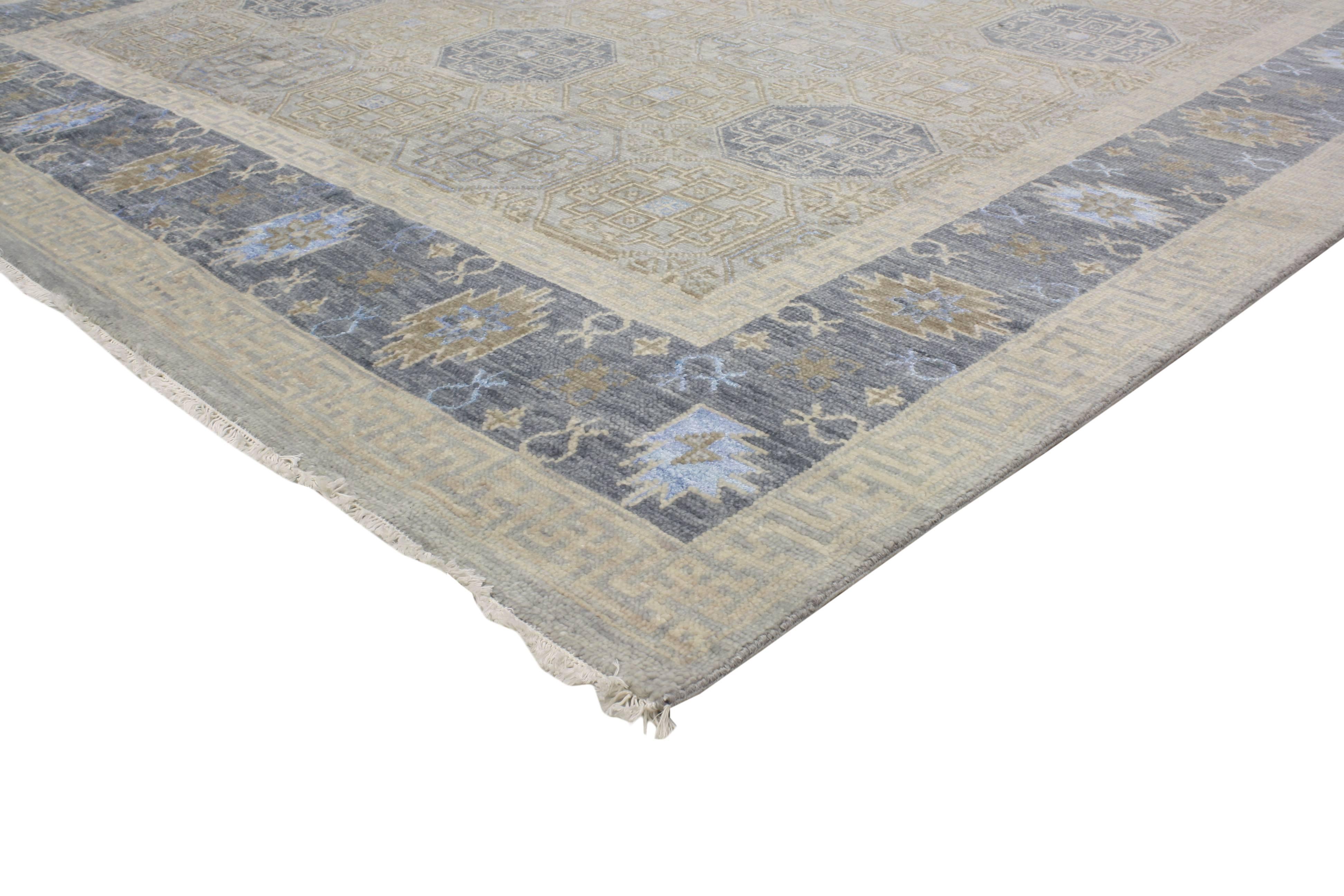 30325 New Transitional Khotan Design Geometric Area Rug, 09'01 x 11'07. This hand-knotted wool and silk transitional Khotan design geometric area rug features a repetitive octagonal motif pattern in alternating colors. Polished and playful combined