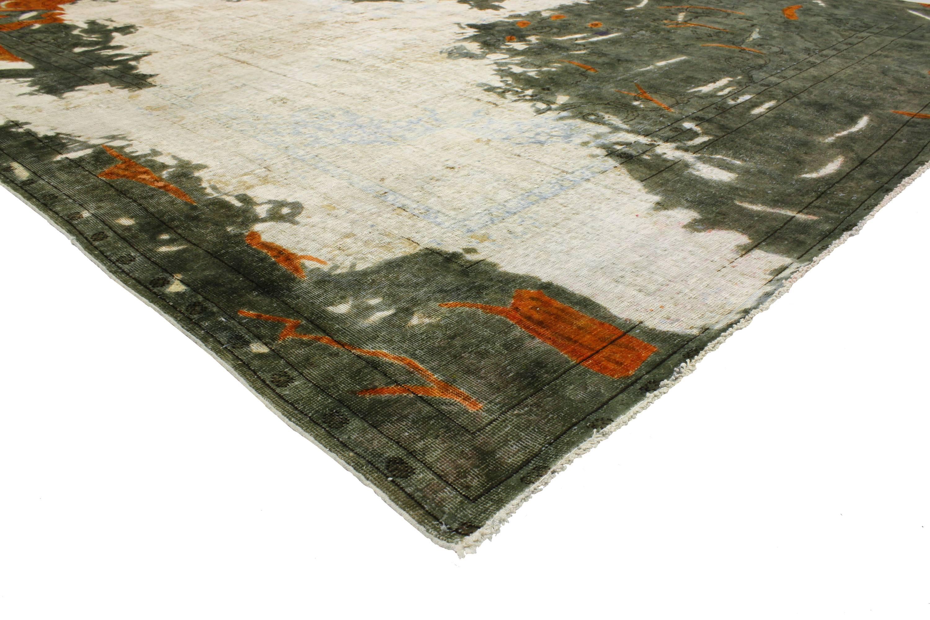 Distressed vintage Persian rug overdyed features a modern Industrial style. From deepening a transitional room, lightening a traditional setting or establishing a color palette, this abstract styled rug can give more than just modern interiors a