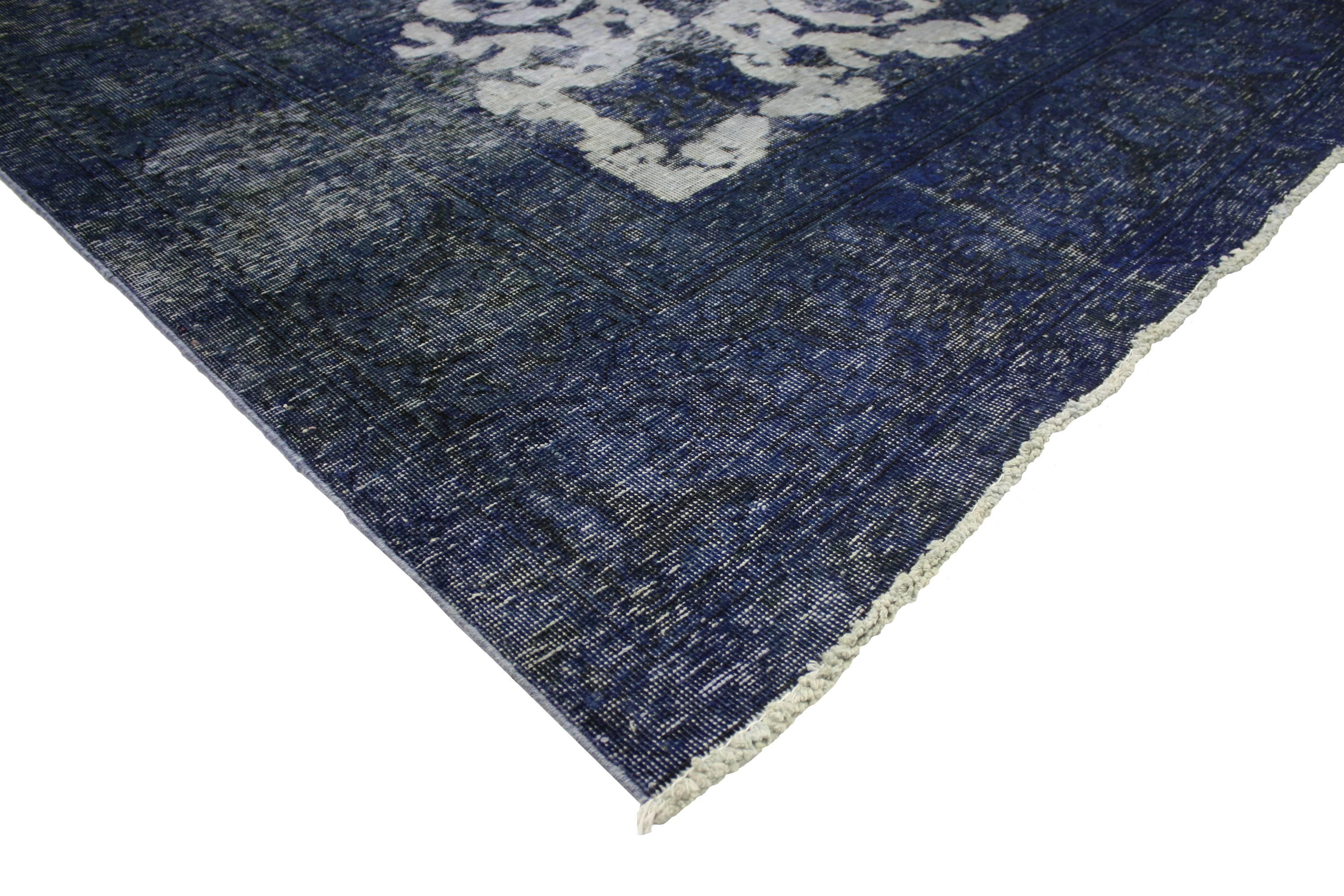 80233 Distressed Overdyed Blue Vintage Persian Rug with Modern Industrial Style. This beautifully composed distressed vintage Persian rug overdyed in blue features a modern Industrial style. Deeply saturated with variegated shades of blue bring a