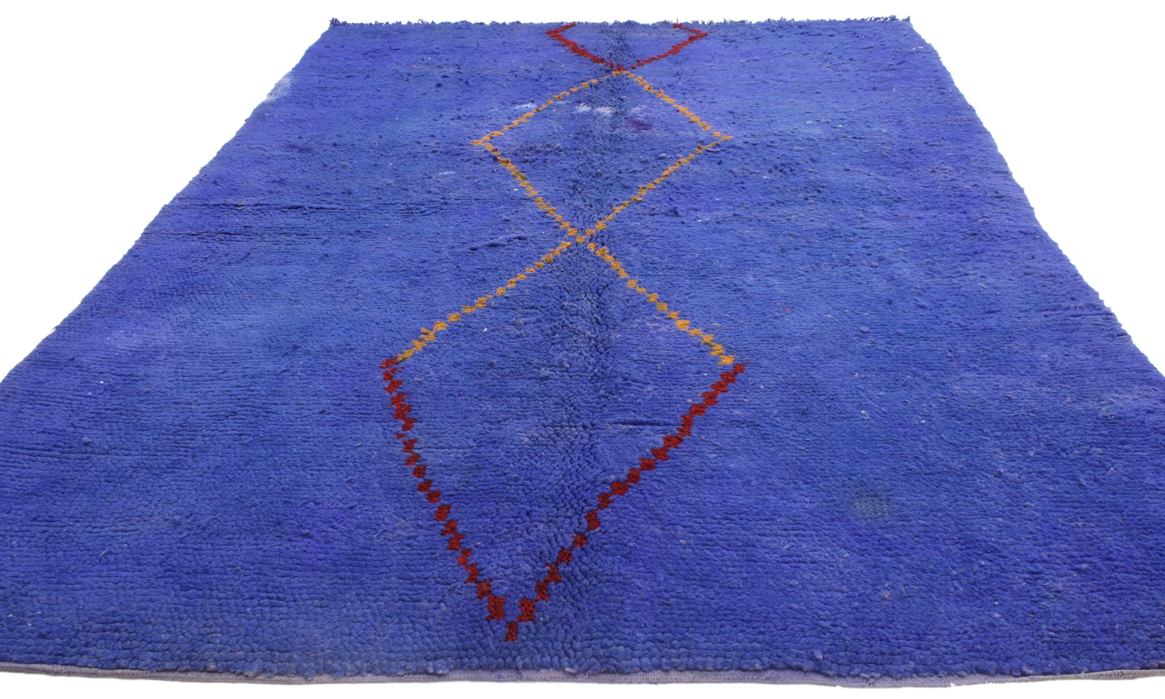 20585 blue vintage Berber Moroccan rug with modern tribal style. Saturated in an extraordinary palette of blue, this vintage Berber Moroccan rug showcases a modern tribal style. The beautifully composed stacked diamond motifs along the center create