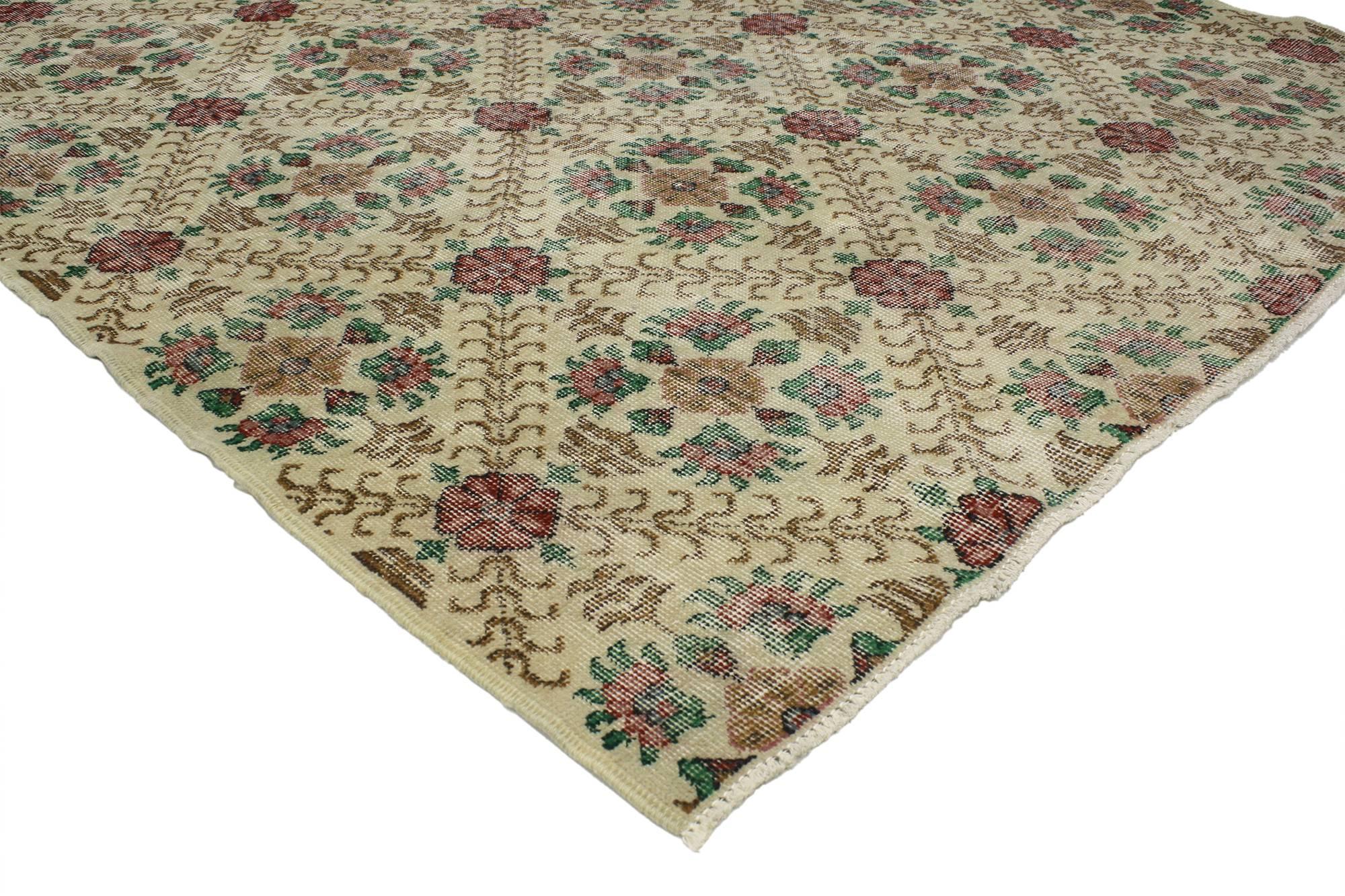 52018 Distressed Turkish Sivas Rug with Shabby Chic English Country Cottage Style. With the perfect mix of romance and simplicity, this hand-knotted wool distressed vintage Turkish Sivas rug embodies a cozy English Country Cottage style. The field