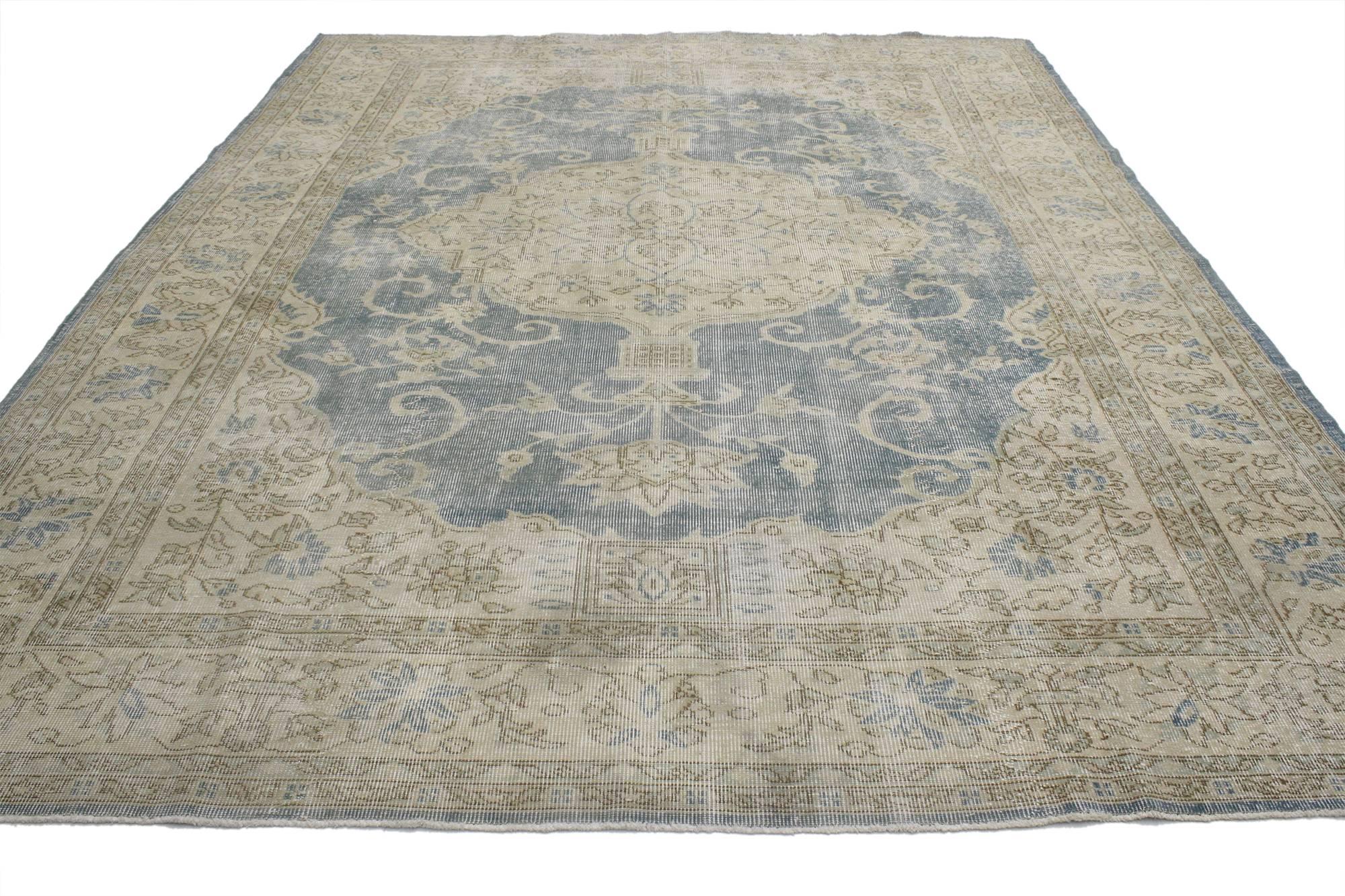 52032, distressed Sivas rug with shabby chic farmhouse style. This distressed vintage Turkish Sivas rug with a Shabby Chic Farmhouse style can make nearly any space feel warm and welcoming. The Turkish Sivas rug showcases a grand medallion filled