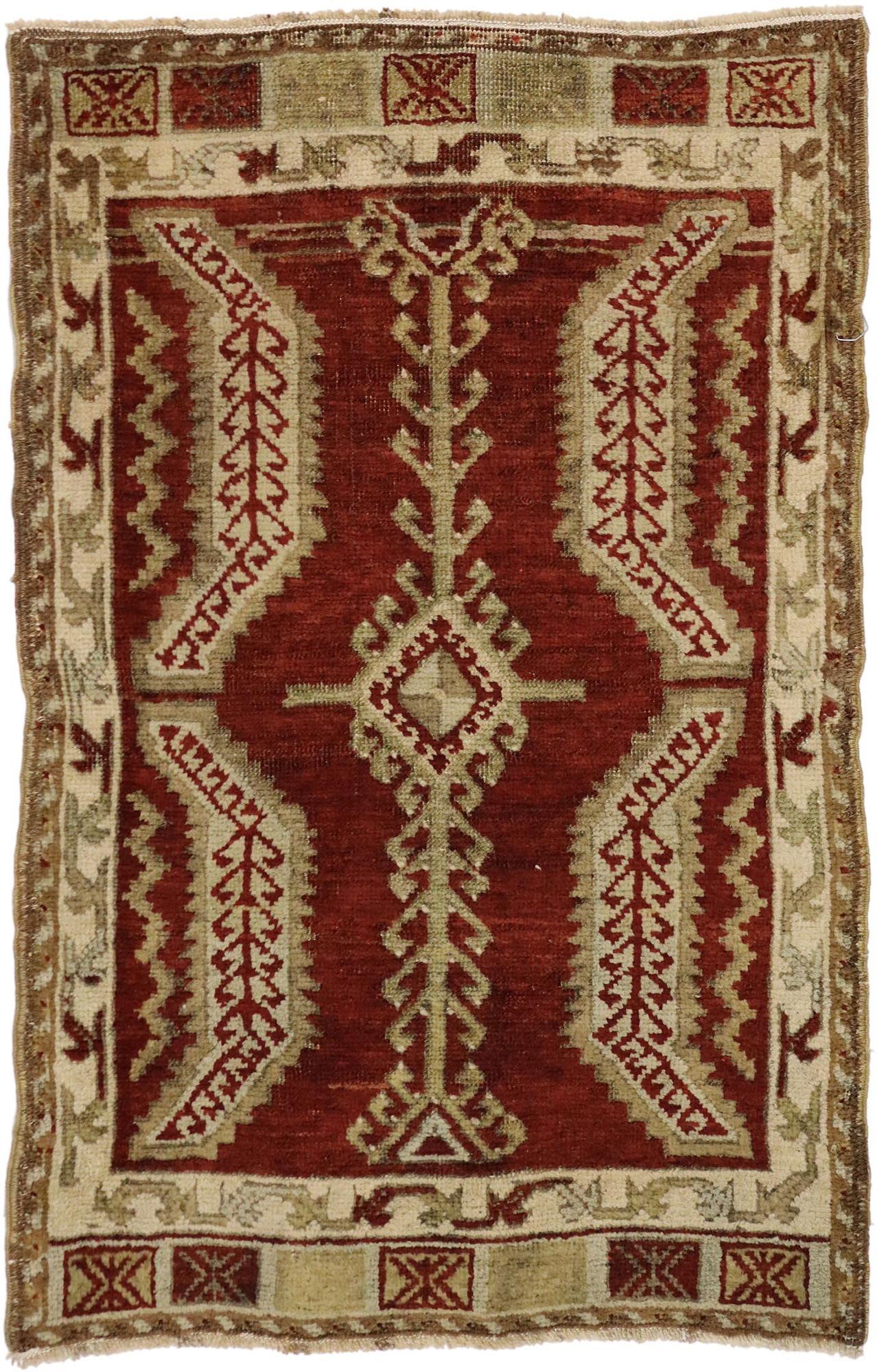 50205 Vintage Turkish Oushak Yastik Scatter Rug, Small Accent Rug 01'10 x 02'10. This hand-knotted wool vintage Turkish Oushak Yastik scatter rug features a diamond lozenge Ram's Horn pole medallion flanked with four serrated leaves patterned with