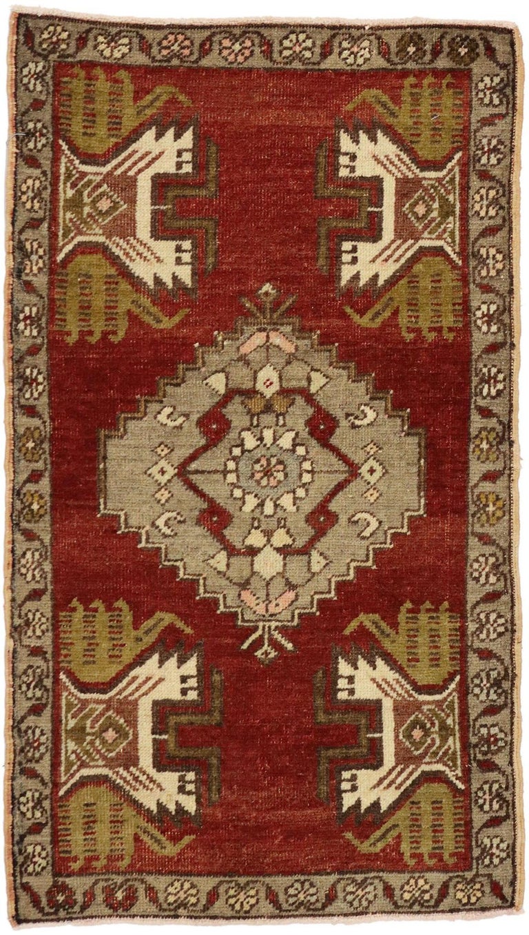 50547 Vintage Turkish Oushak Yastik Scatter Rug, Small Accent Rug 01'07 x 02'10. This hand-knotted wool vintage Turkish Oushak Yastik scatter rug features a central stepped medallion patterned with a geometric botanical scene flanked with four