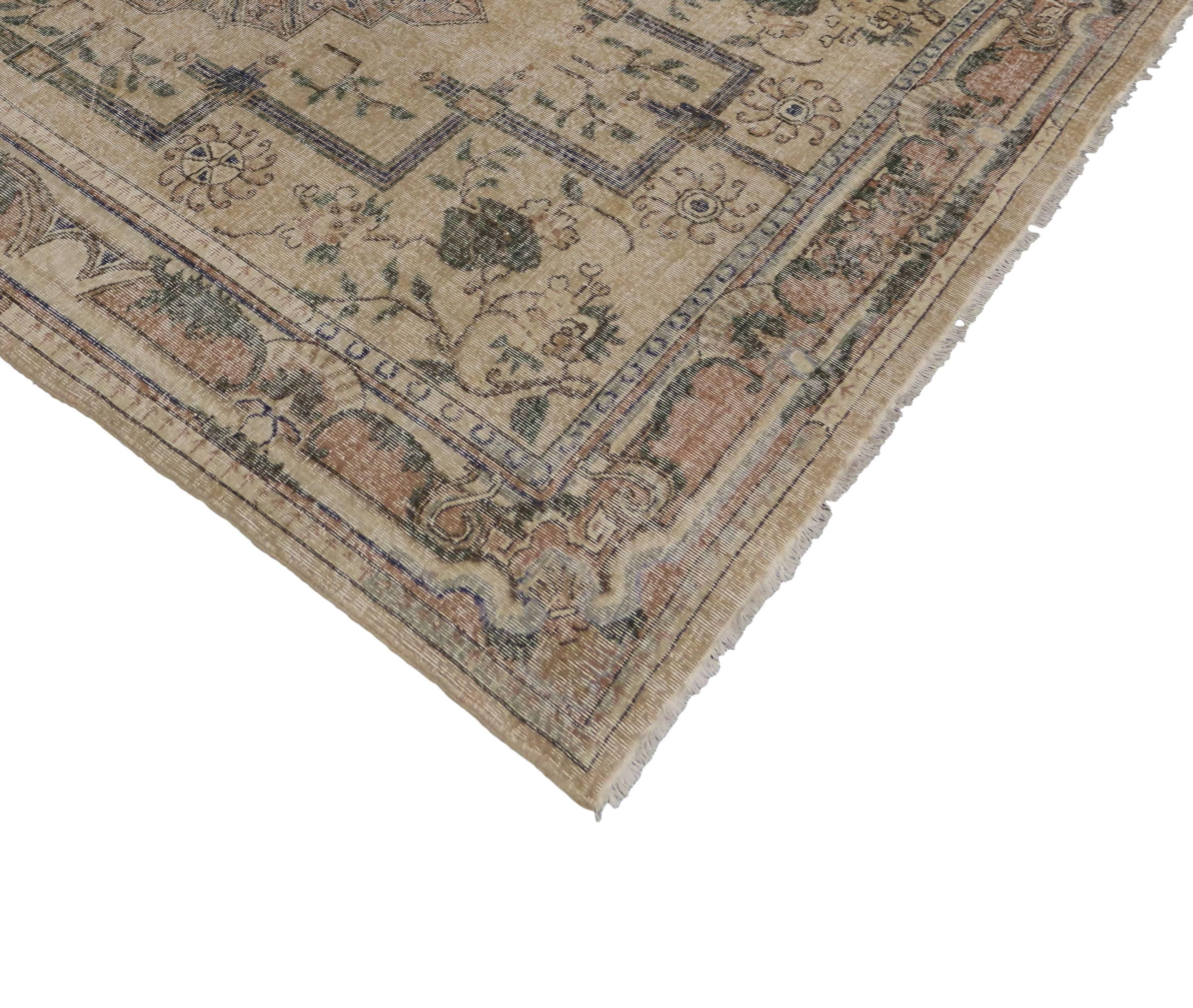50869 Distressed Vintage Turkish Sivas Area Rug with Rustic Art Deco Cottage Charm. This hand-knotted wool distressed vintage Turkish Sivas rug features a center medallion surrounded by leafy tendrils surrounded by a rectilinear banded outline. The