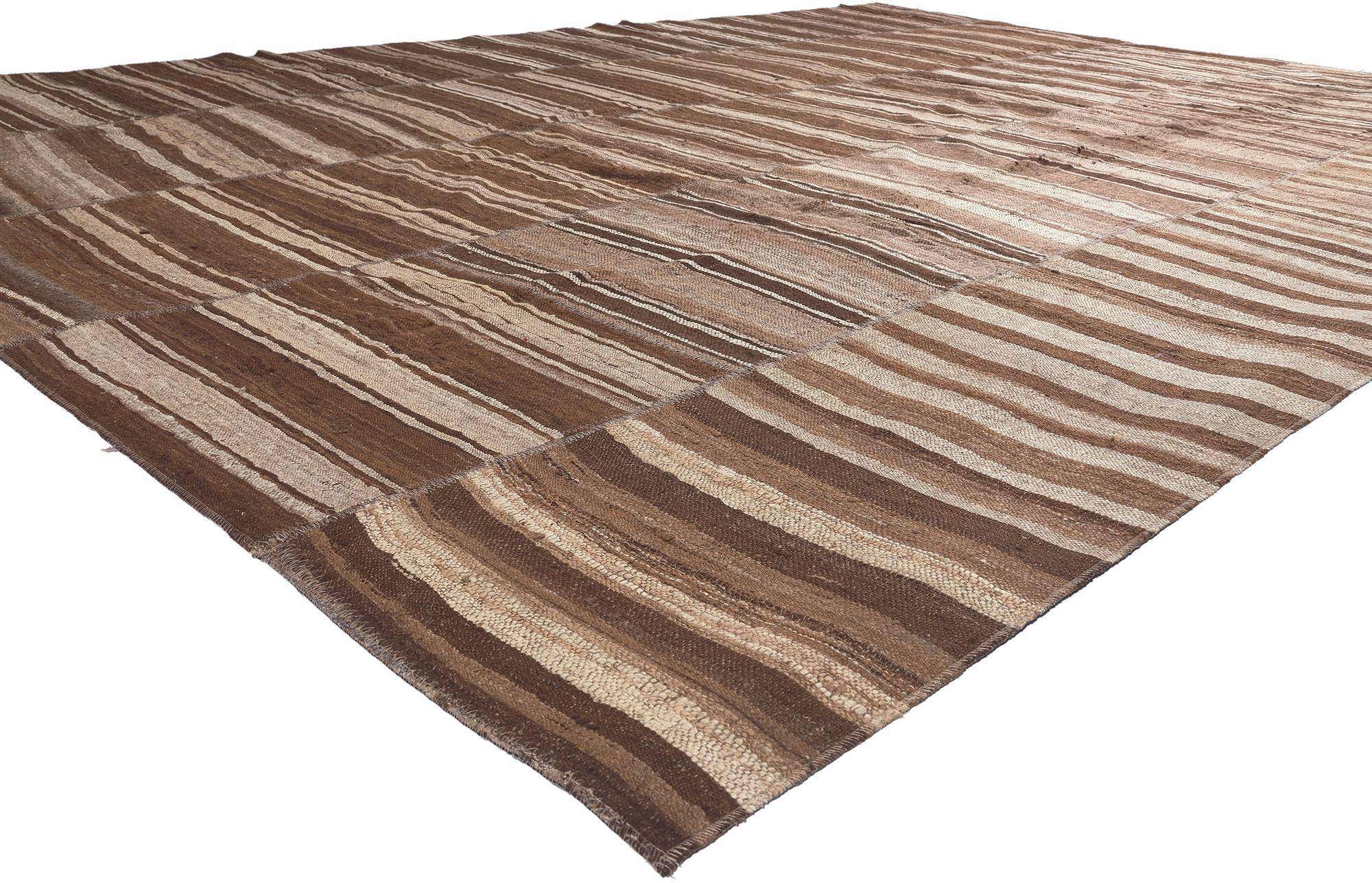 60632 Brown Vintage Turkish Striped Kilim Rug, 10'01 x 14'02. In the crafting of this vintage Turkish kilim rug, the essence of Wabi-Sabi seamlessly intertwines with sustainable design, giving rise to a masterpiece that blends rustic elegance with a