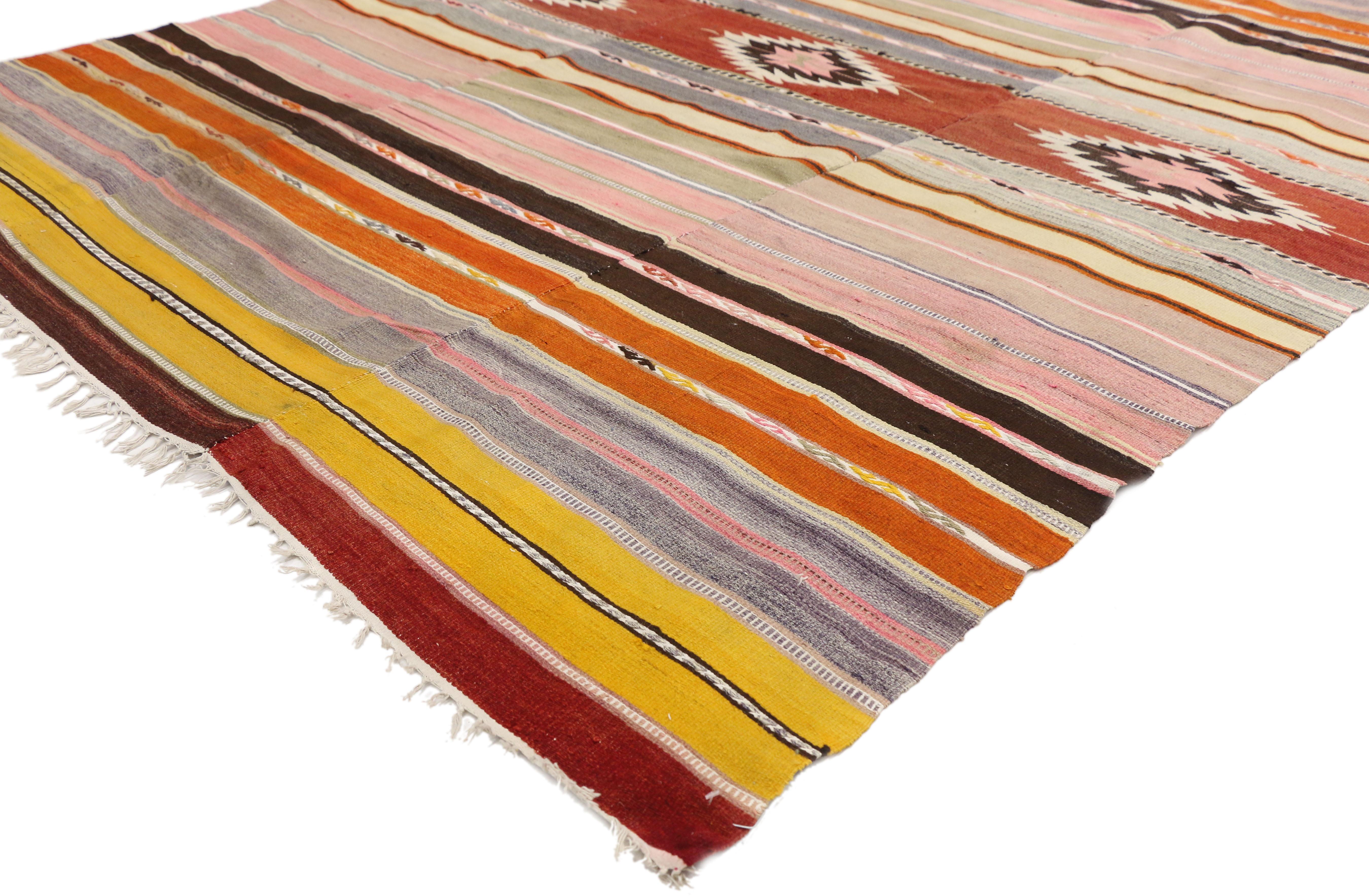 51279, southwestern Bohemian vintage Turkish Kilim rug, flat-weave Kilim tribal rug. This hand woven wool vintage Turkish Kilim rug displays symbolic tribal motifs and bright hues make a statement and create a sense of animation. This Southwestern