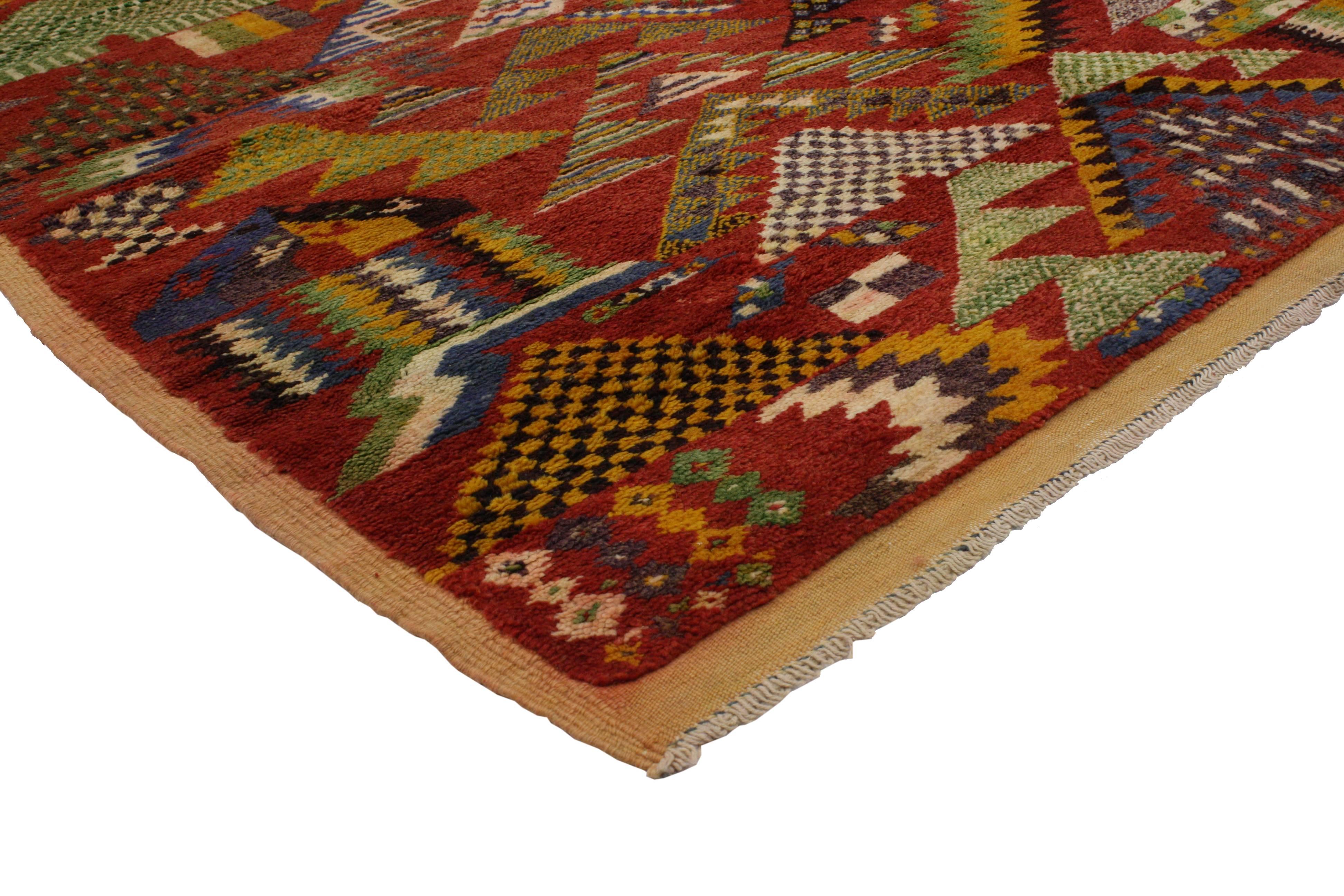 Moroccan rugs are known for their dynamic colorful designs and for their strong sense of geometric structure. Adding a unique flair to timeless tribal design, this unique Moroccan rug will create a truly tempting look for nearly any interior space.