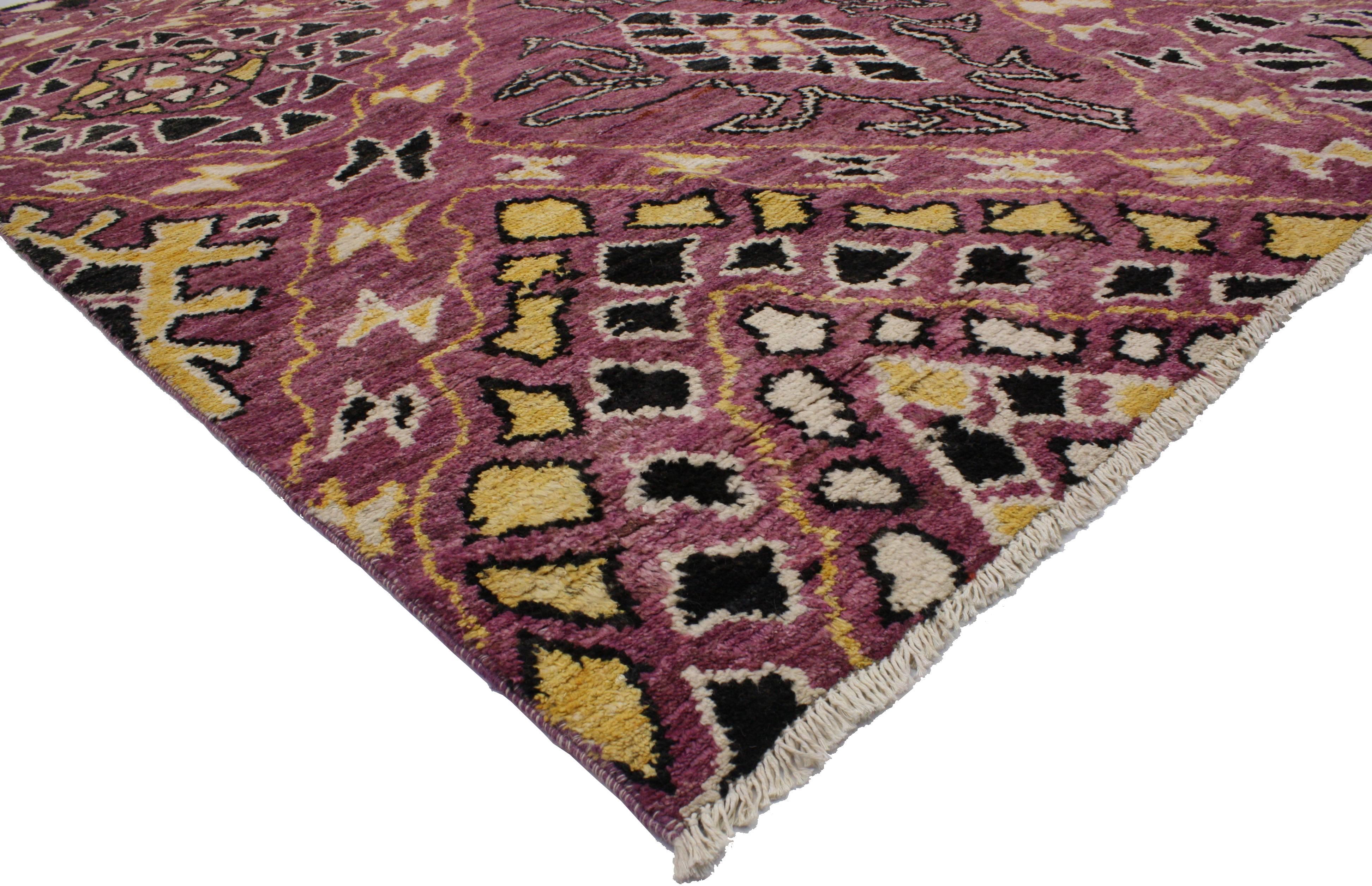 This contemporary Moroccan style rug is a one-of-a-kind piece. Featuring an energetic explosion of abstract lozenge symbols combined with a beautiful color palette consisting of plum, pale freesia yellow, ivory, black and brown will add instant