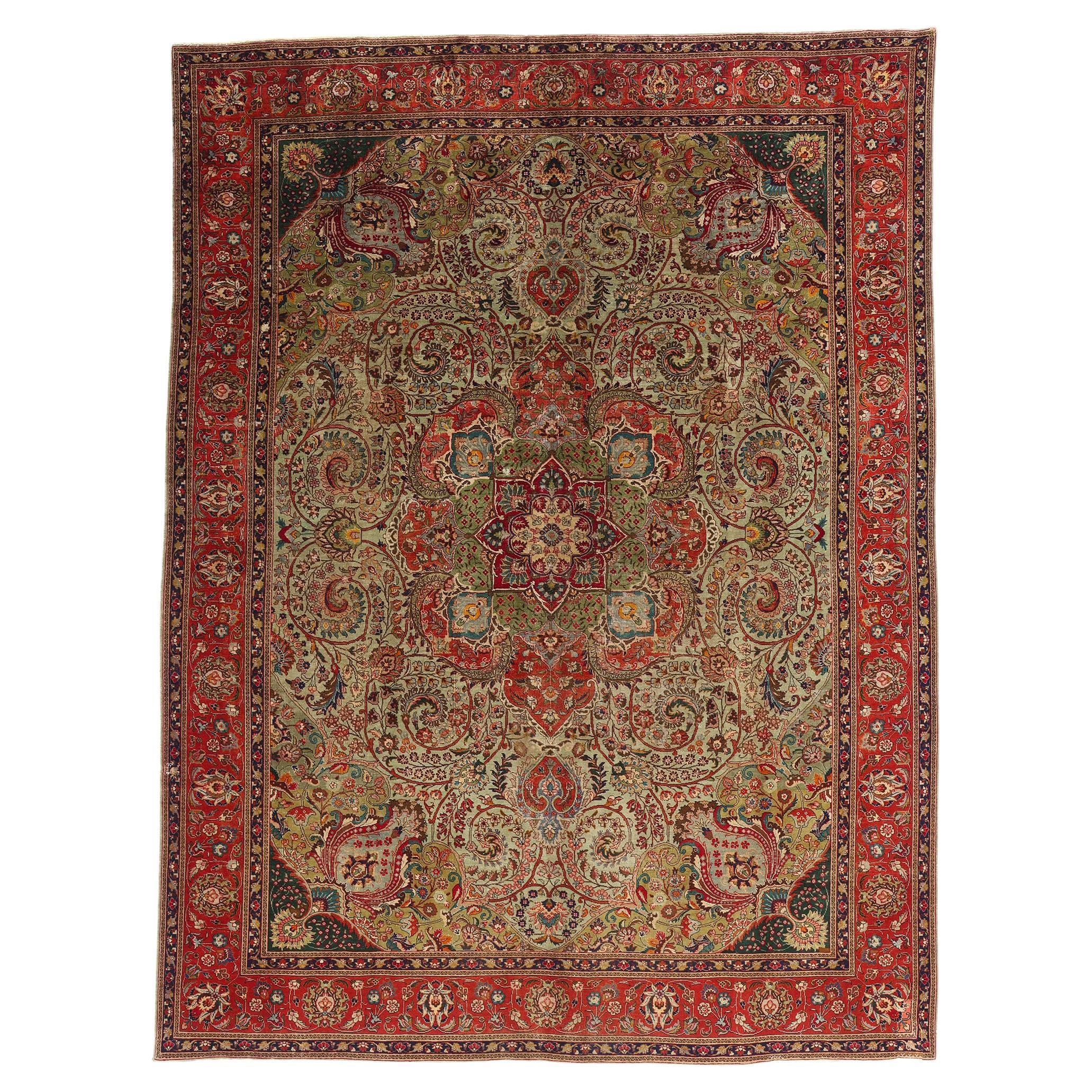 Antigua alfombra persa tabriz verde de estilo tradicional