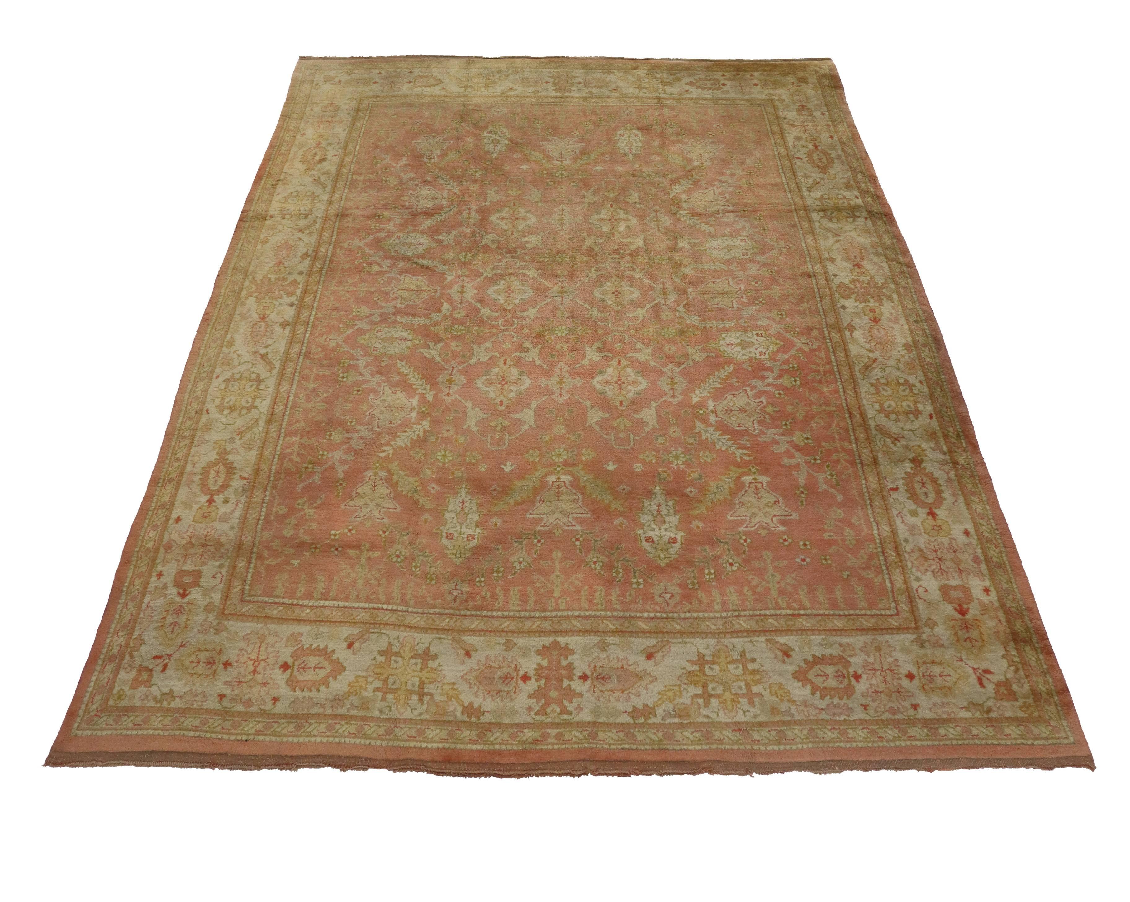 Wool Antique Turkish Oushak with Rustic Georgian Farmhouse Style and Pastel Colors For Sale