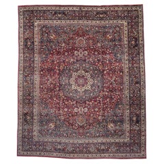 The Sovereign Reverie: An Antique Persian Mashhad Masterpiece of Regal Splendor