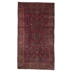 The Crimson Legacy: An Antique Persian Sarouk Masterpiece of Timeless Elegance