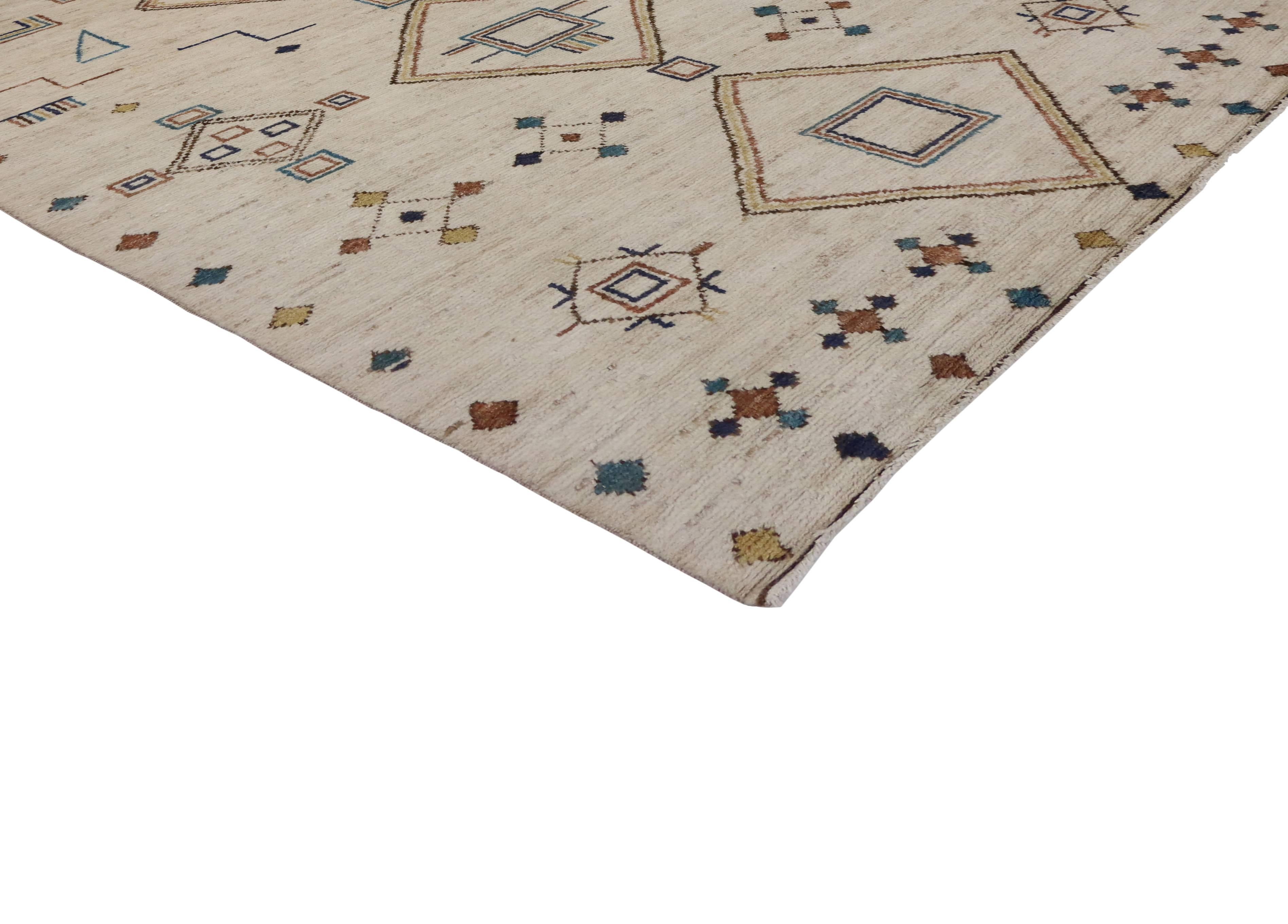 This Moroccan area rug harmonizes disparate elements, brings soothing serenity while adding texture and depth to your space. This is a fantastic example of a contemporary Moroccan area rug with Modern Tribal style, woven with a clean and simple, yet