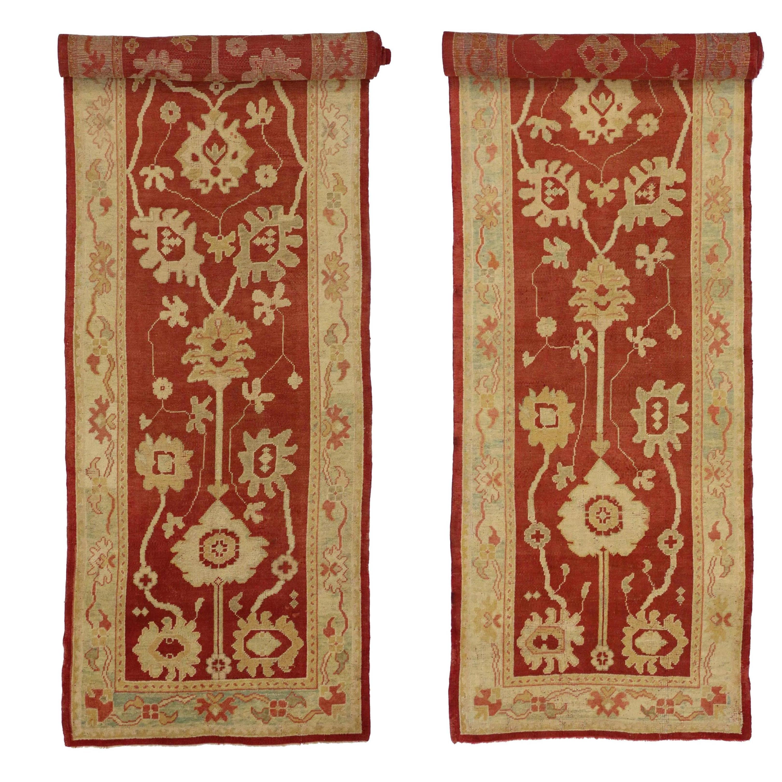 74233-73535 Pair of Matching Antique Turkish Oushak Rug Runners. Exuding both character and an air of timeless elegance, this hand-knotted wool antique Turkish Oushak rug runner effortlessly blends tradition with contemporary appeal. Its design