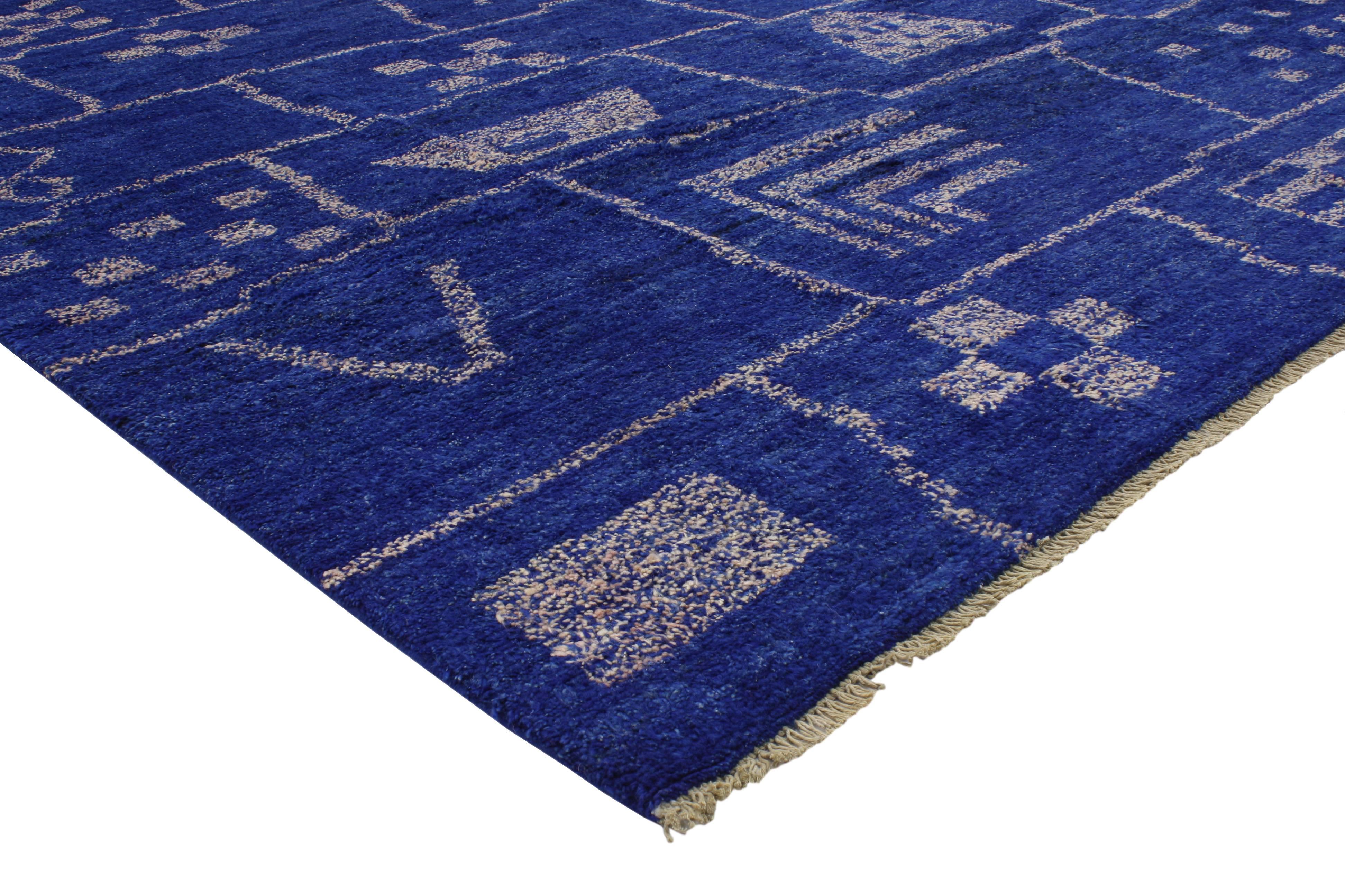 Saturated in an extraordinary palette of cobalt blue, this Moroccan style rug showcases true simplistic style with a punch of color. The geometric motifs and linear lines in this awe-inspiring composition create something a little more modern and
