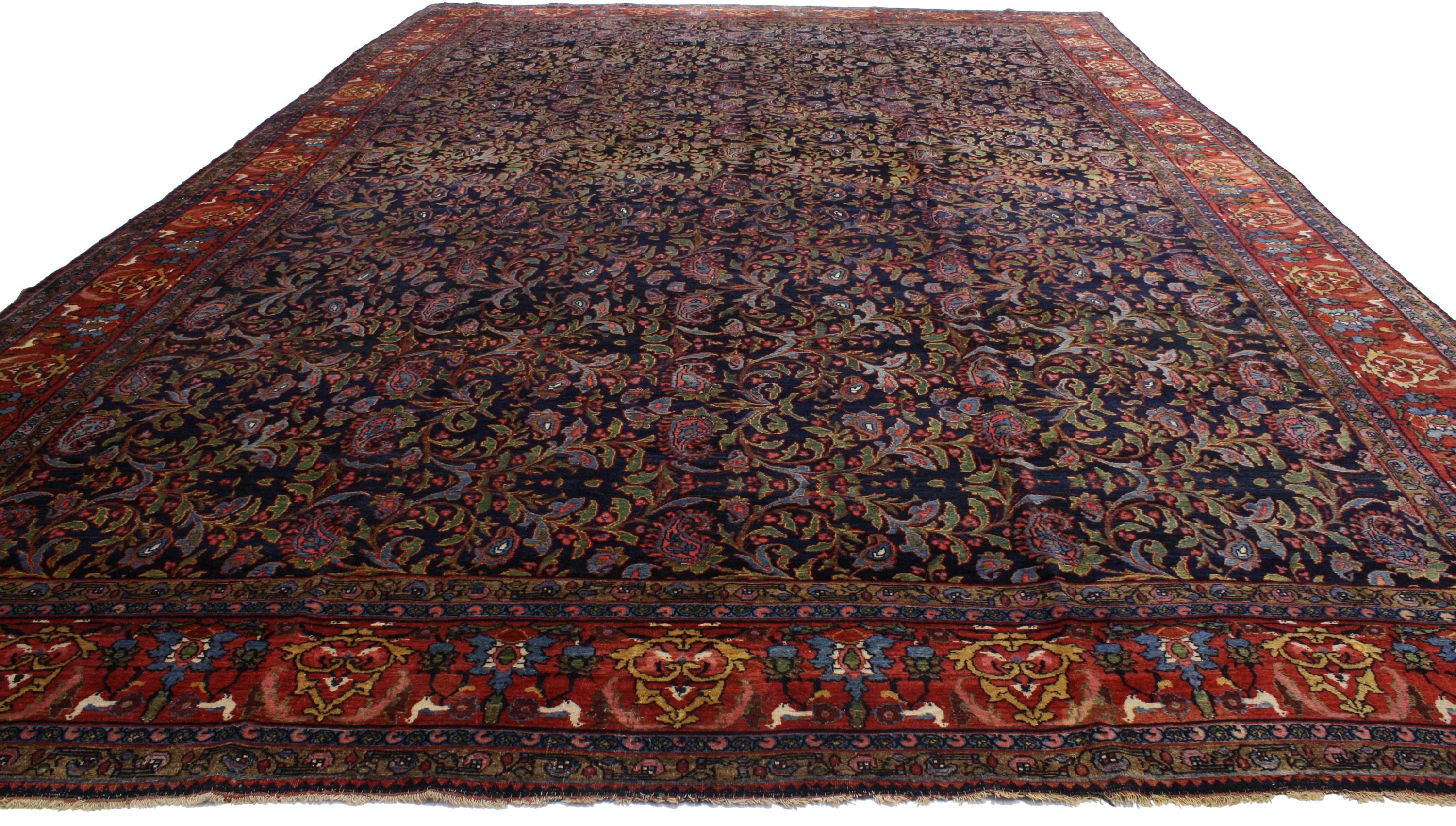 74205 Antique Kurdish Persian Bijar Rug with Art Nouveau Renaissance Style, 12'02 X 18'04. Rich in color with beguiling beauty, this hand knotted wool antique Persian Kurdish Bijar rug beautifully embodies Art Nouveau Renaissance style​. The