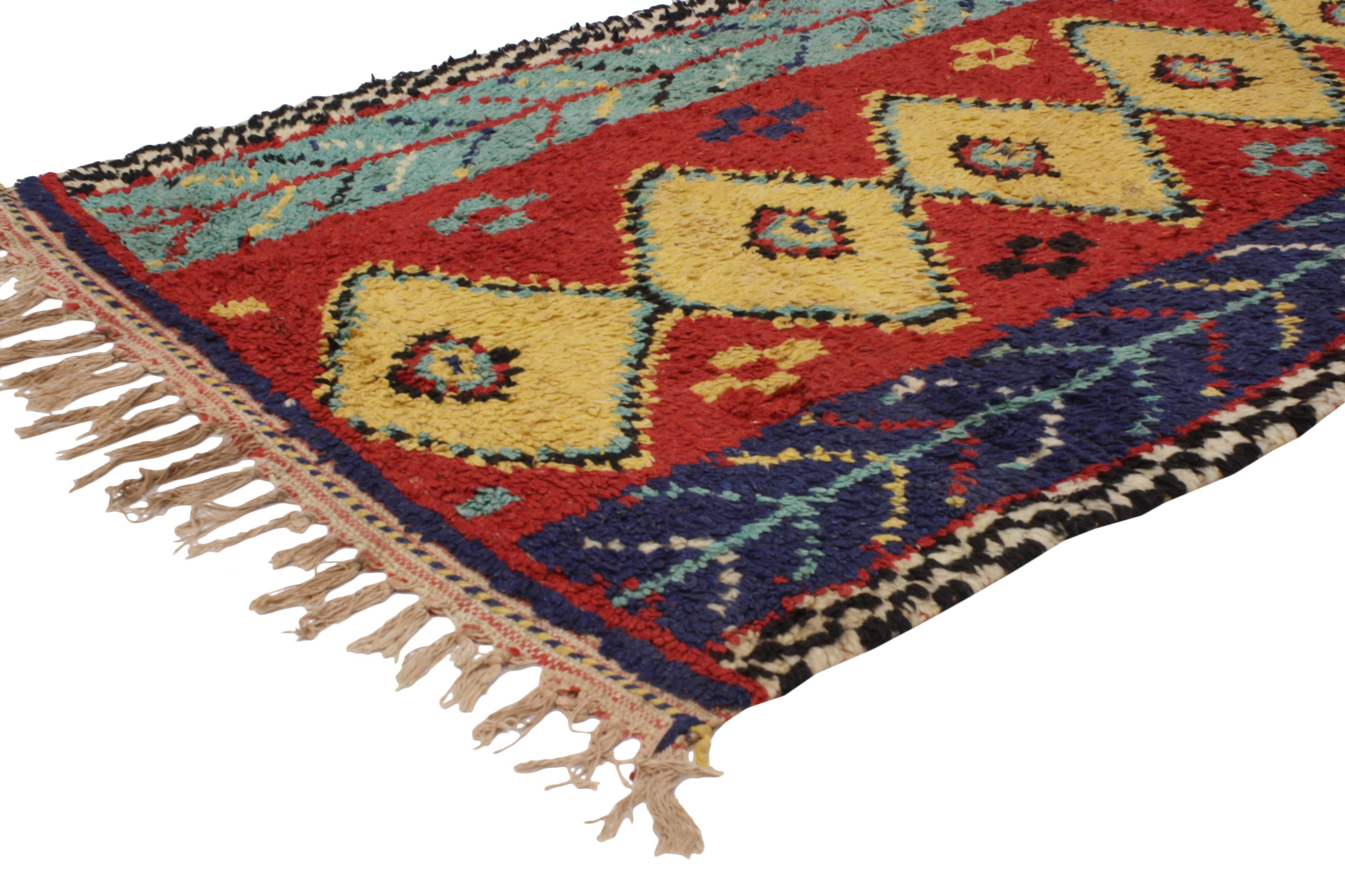 20445 Vintage Berber Moroccan Rug with Tribal Style. With its bold colors and geometric tribal design aesthetic, this hand-knotted wool vintage Berber Moroccan rug gives a youthful and whimsical feel. It features a stacked column of saffron colored
