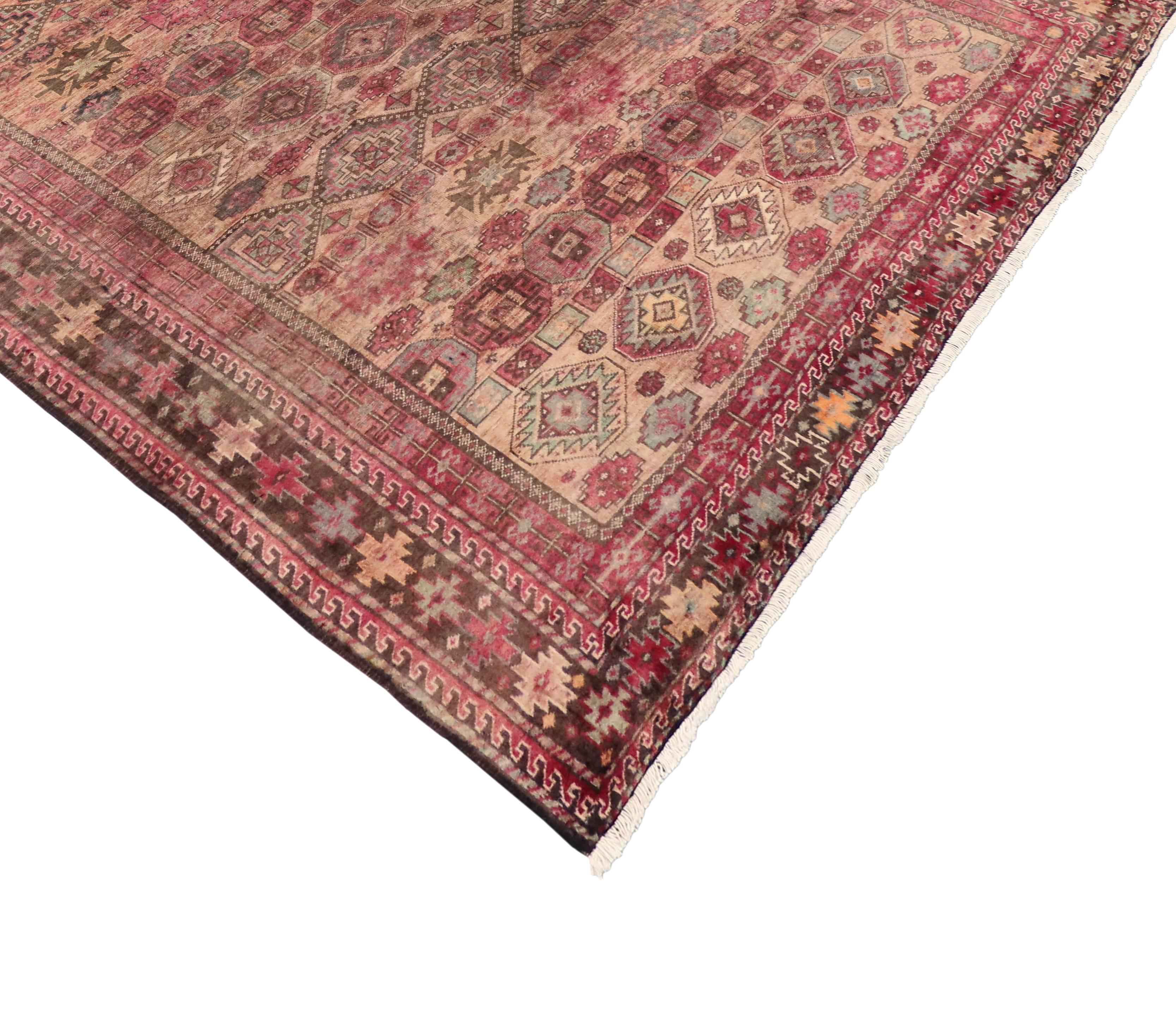 76544 Vintage Persian Baluch Rug with Modern Tribal Style, Pink Persian Area Rug. Features all-over geometric and tribal motifs in an abrash field of soft colors. Rendered in variegated shades of raspberry, pink, blush, apricot, grey and brown with