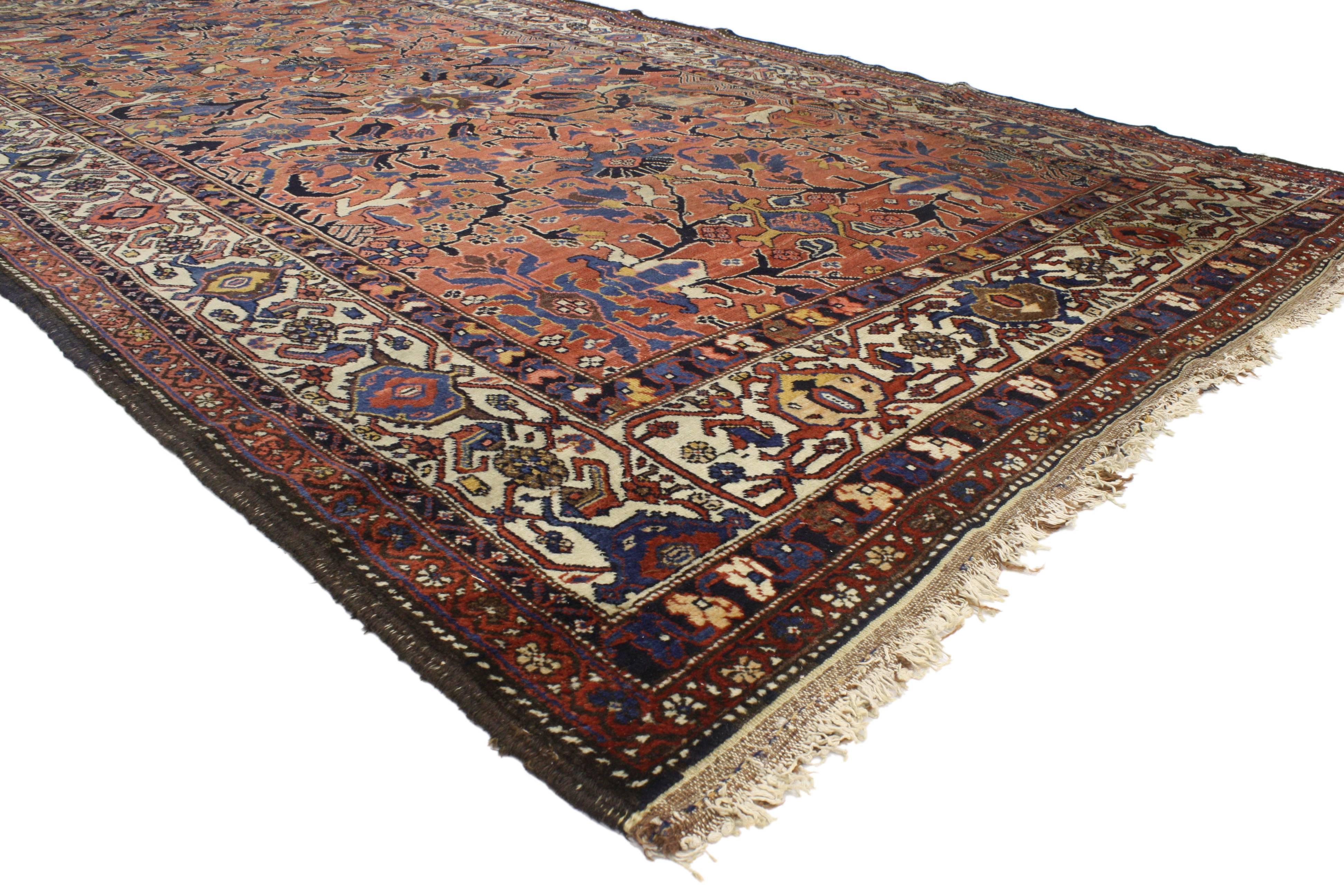 76945 Distressed Antique Persian Bijar Rug with Modern Rustic Style. Warm and inviting, this hand-knotted wool distressed antique Persian Bijar rug beautifully embodies a modern rustic style. The weathered field highlights an all-over botanical