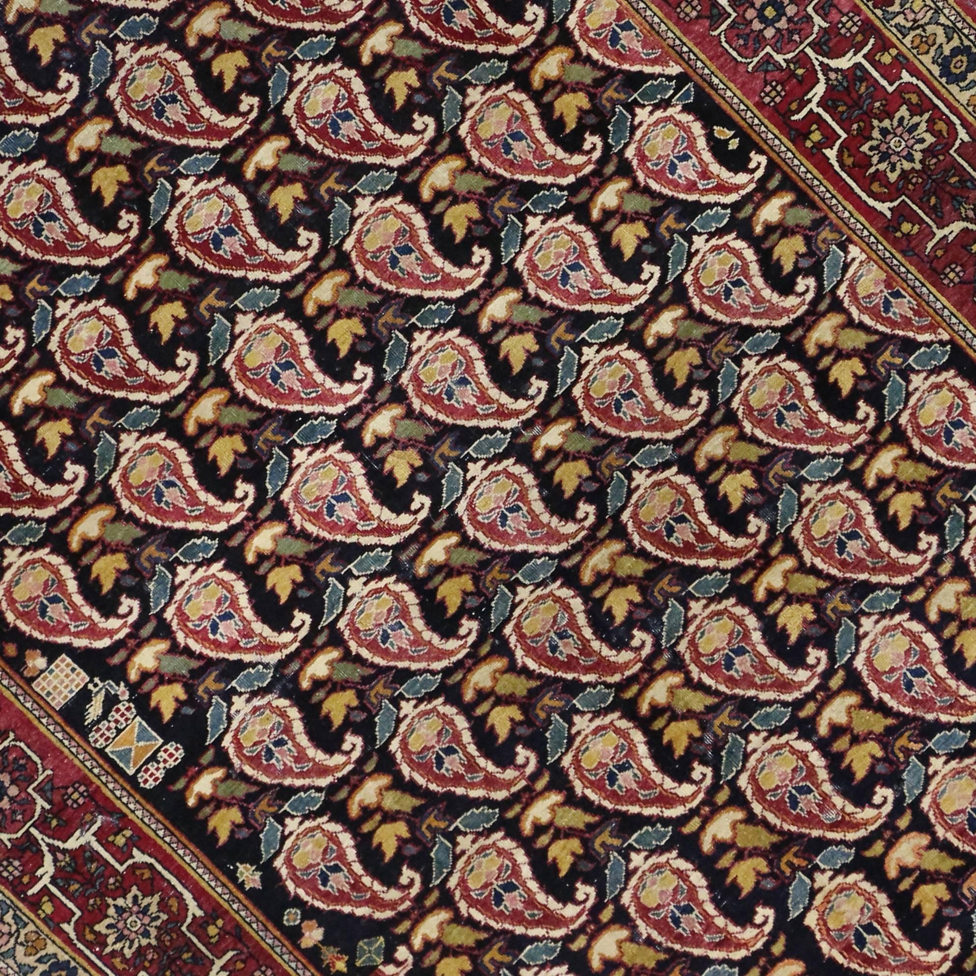 Russe Tapis persan ancien Kerman avec motif Boteh sur toute sa surface en vente