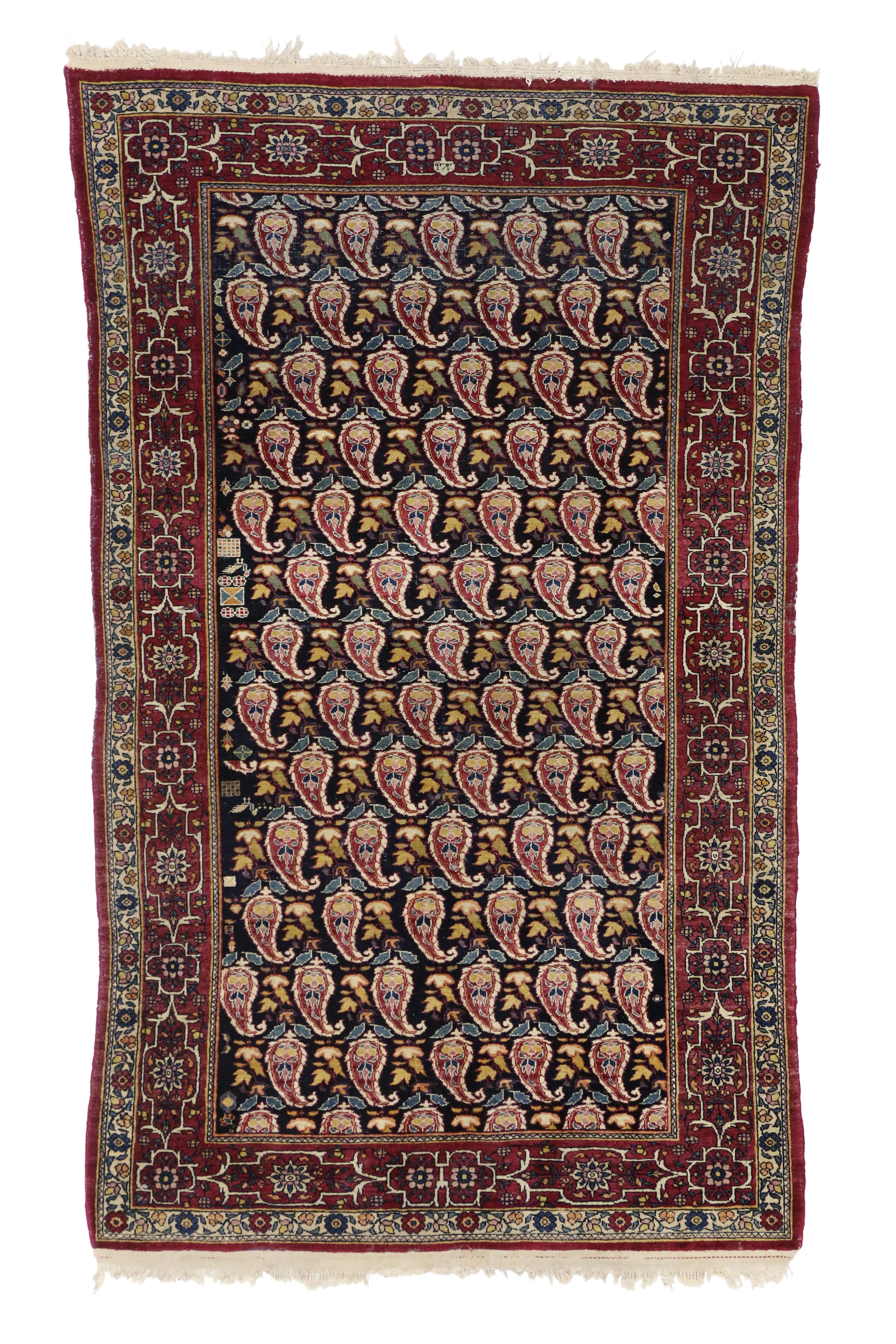 Antique Persian Kerman Rug with All-Over Boteh Pattern In Distressed Condition For Sale In Dallas, TX