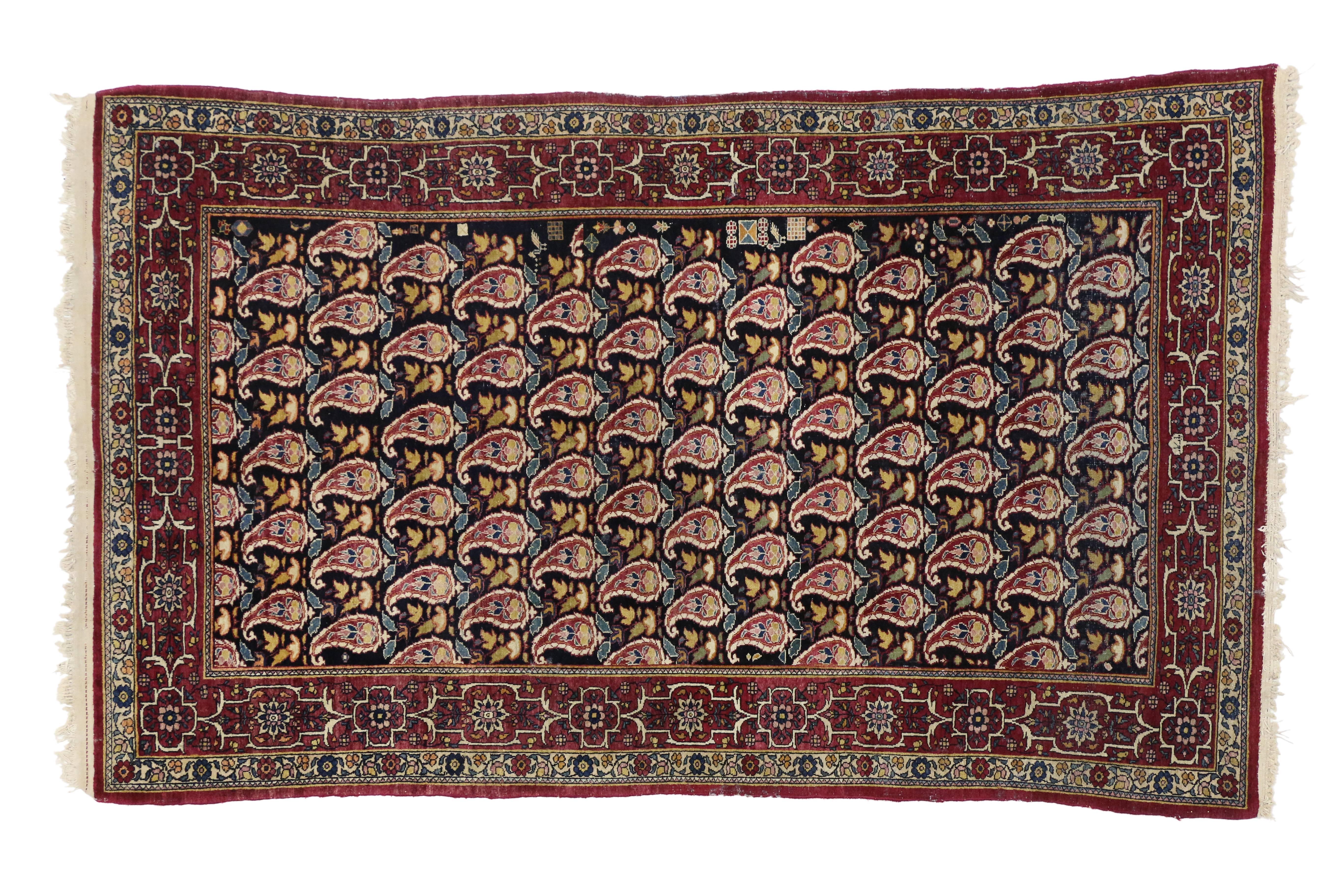 20ième siècle Tapis persan ancien Kerman avec motif Boteh sur toute sa surface en vente
