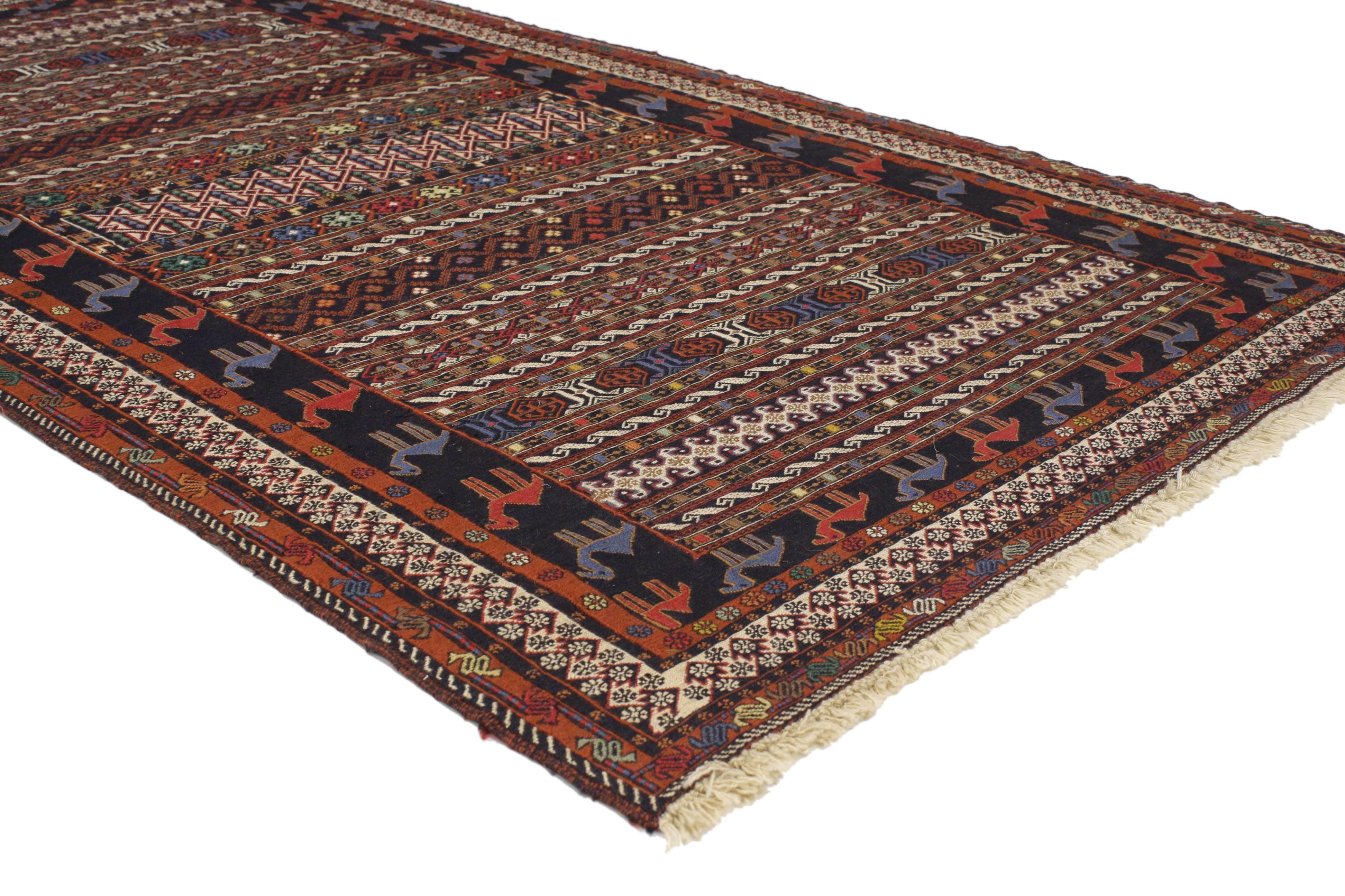 76999 Vintage Soumak Persian Rug With Tribal Style. This hand-woven vintage Persian Soumak rug features a series of horizontal bands composed of ancient symbolic tribal motifs. It is enclosed with a series of guard bands. Perfect for a hallway,