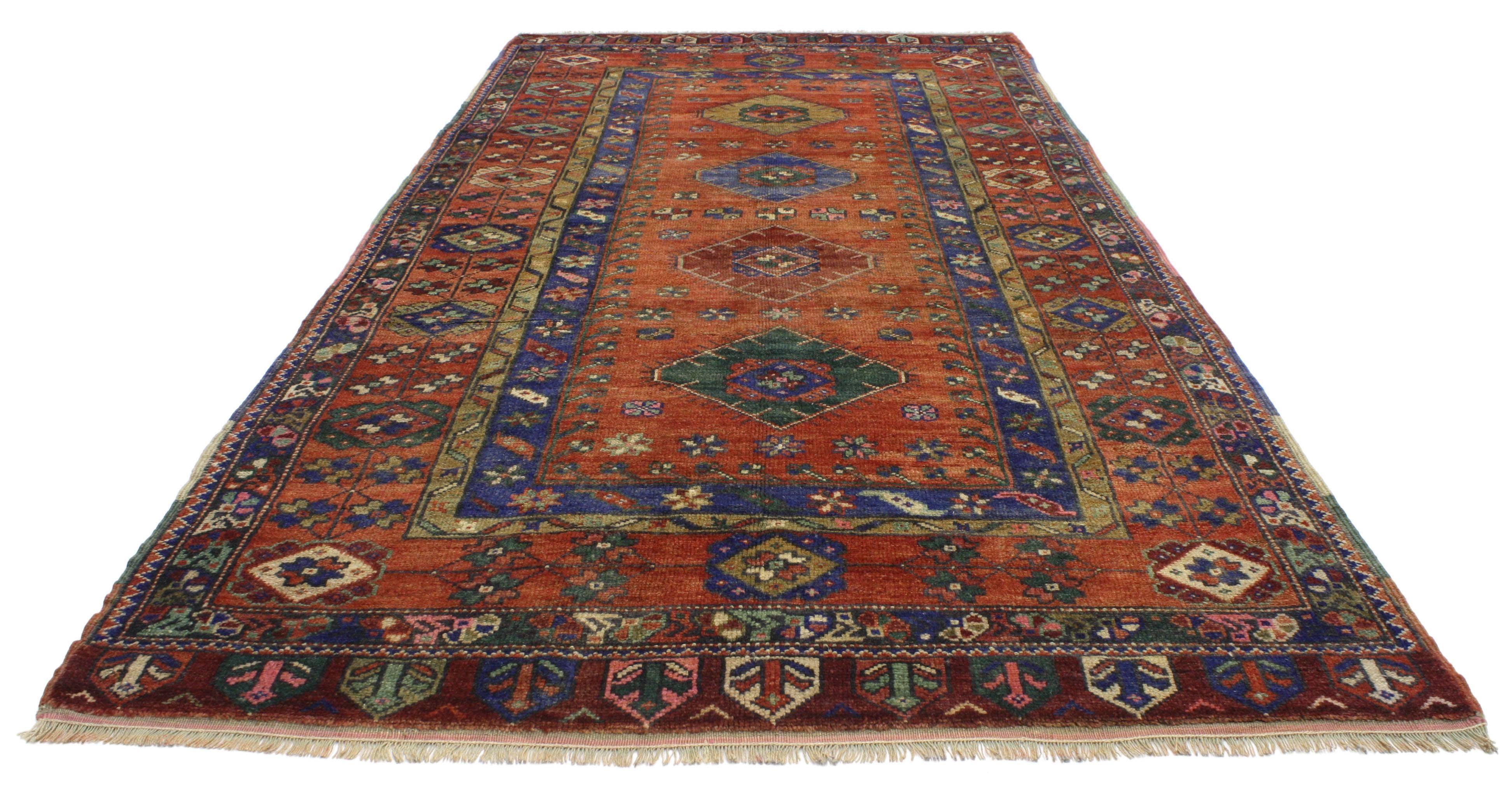 52180 Oushak Vintage Turkish Oushak Runner with Modern Tribal. This vintage Turkish Oushak carpet runner with modern tribal style communicates some of the finer and more important points of Turkish design elements. Features four medallions