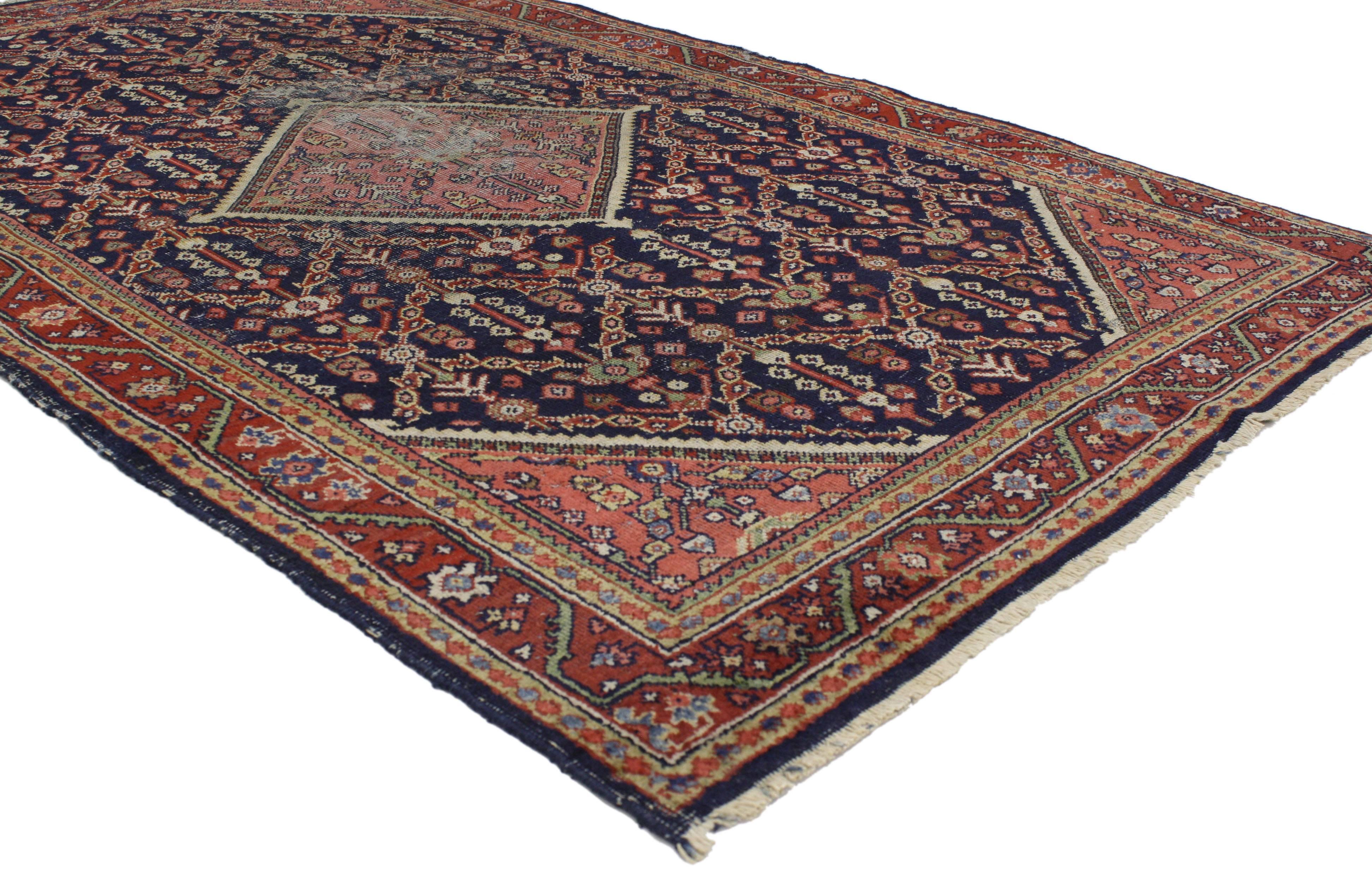 77011 Distressed Antique Persian Mahal Rug with Modern Rustic English Traditional Style 04'05 x 06'05. With a timeless design and nostalgic charm, this hand knotted wool distressed antique Persian Mahal rug can beautifully blend modern, contemporary