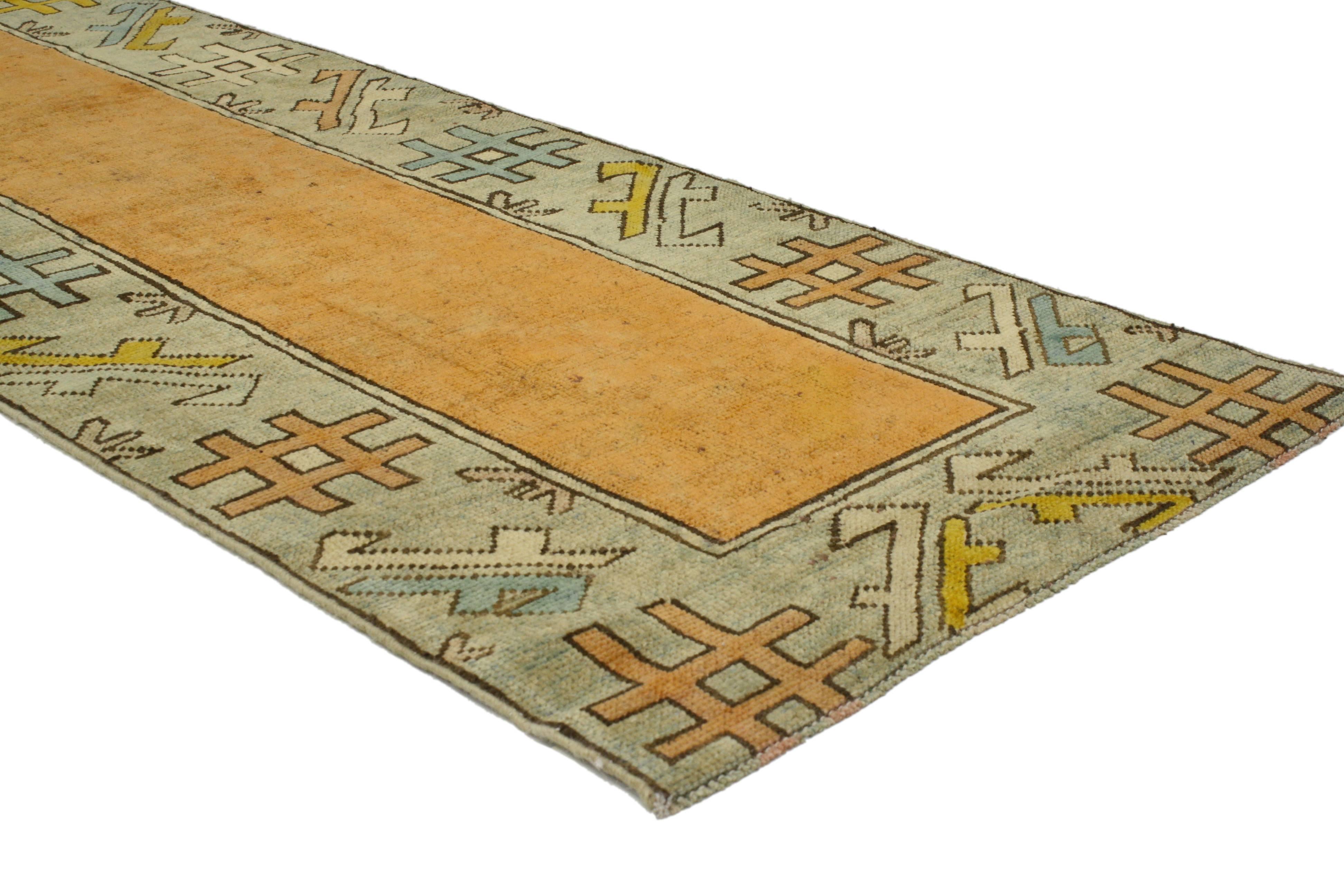 52050 Vintage Turkish Oushak Hallway Runner with International Art Deco Style. This hand-knotted wool vintage Turkish Oushak runner beautifully highlights Art Deco and International style. It features a vibrant orange field. The vintage Oushak