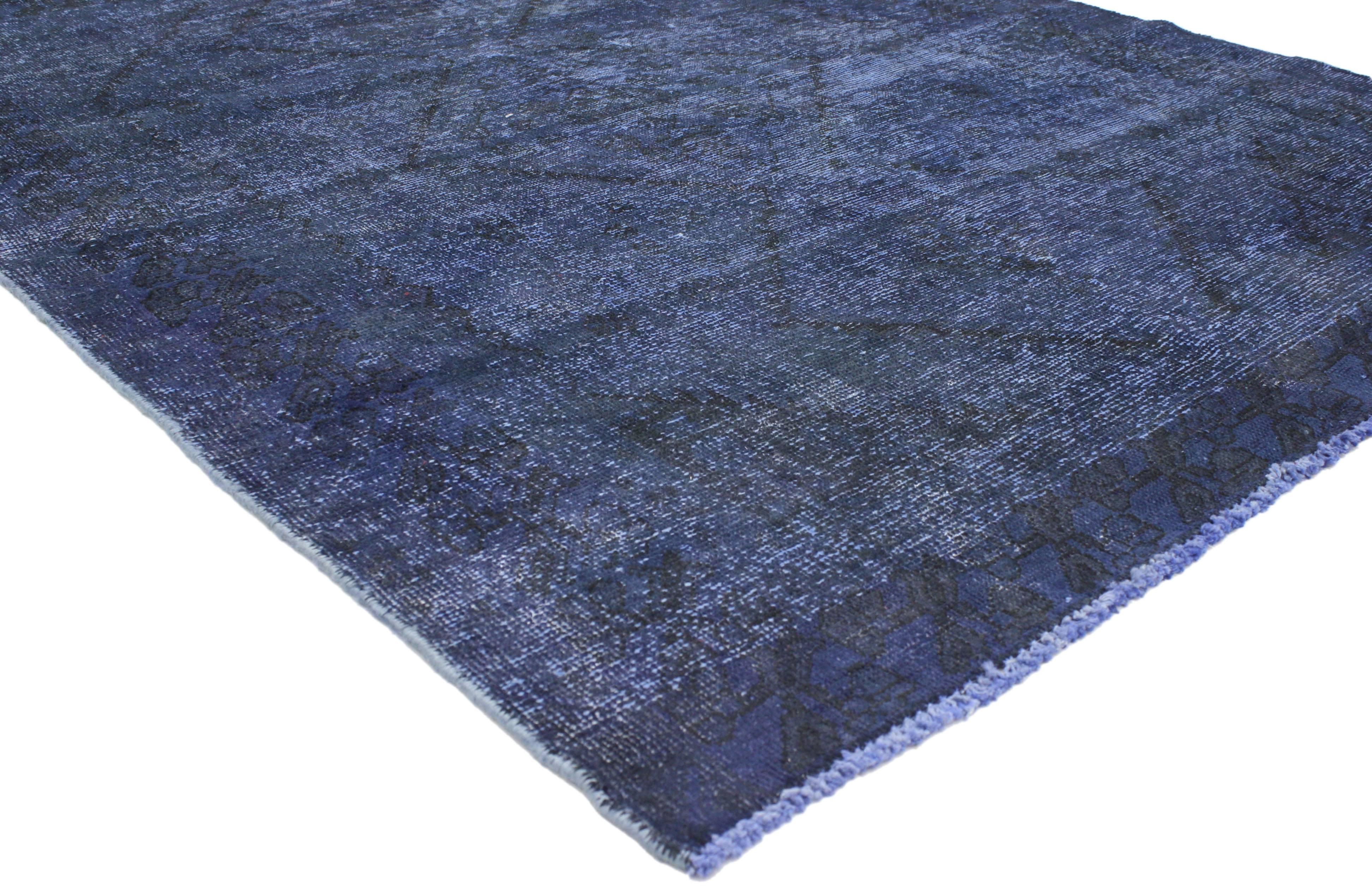 80418 Distressed Vintage Blue Persian Overdyed Rug with Luxe Mediterranean Style. Luxe Mediterranean style meets elegant simplicity in this hand-knotted wool distressed vintage overdyed blue Persian rug. The field is covered in an all-over botanical