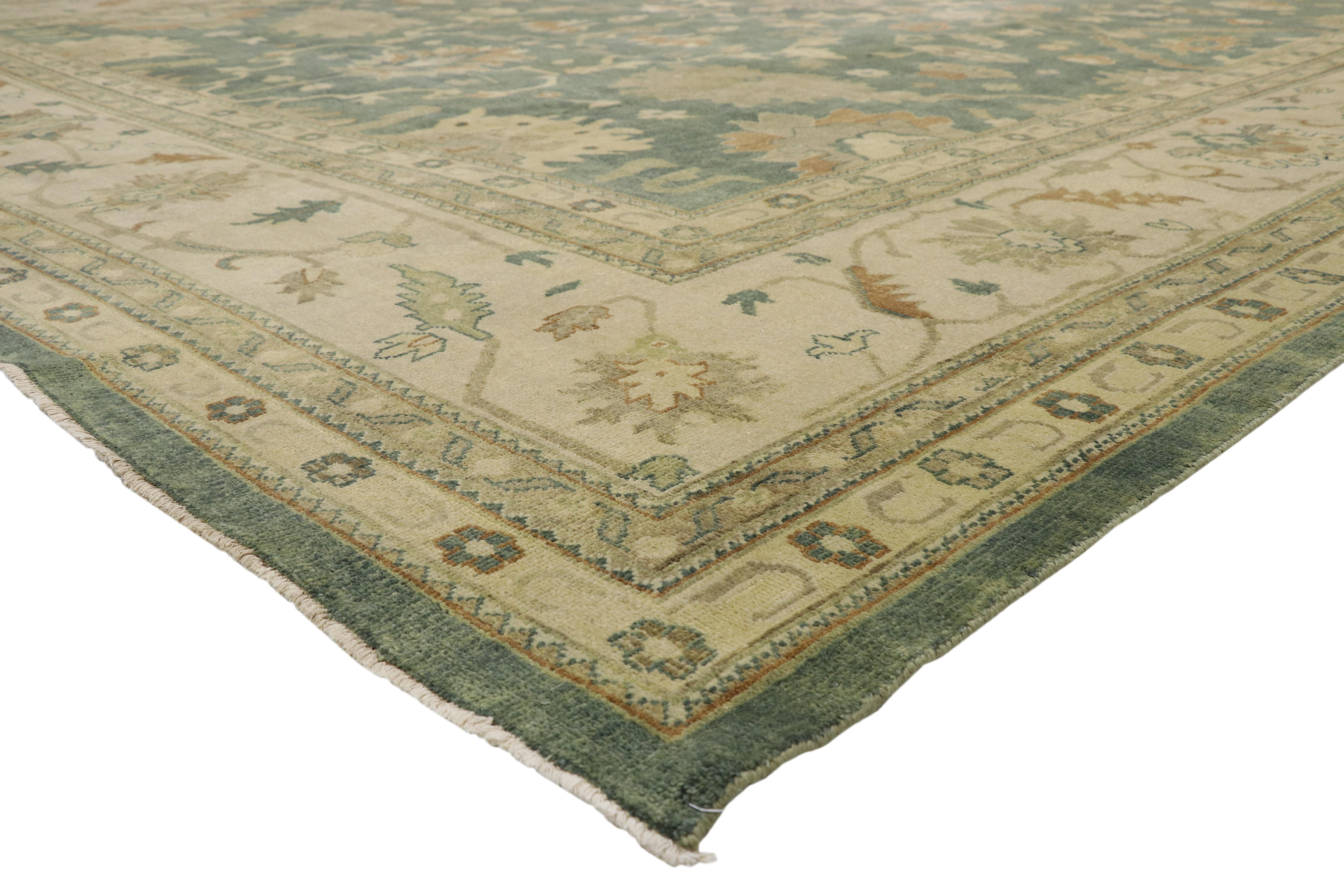 30180 New Transitional Oushak Palace Size Rug with Hollywood Regency Style 14'00 x 17'11. This hand-knotted wool Oushak palace size rug features a classic pattern composed of Harshang motifs, palmettes, stylized florals, and organic shapes. These