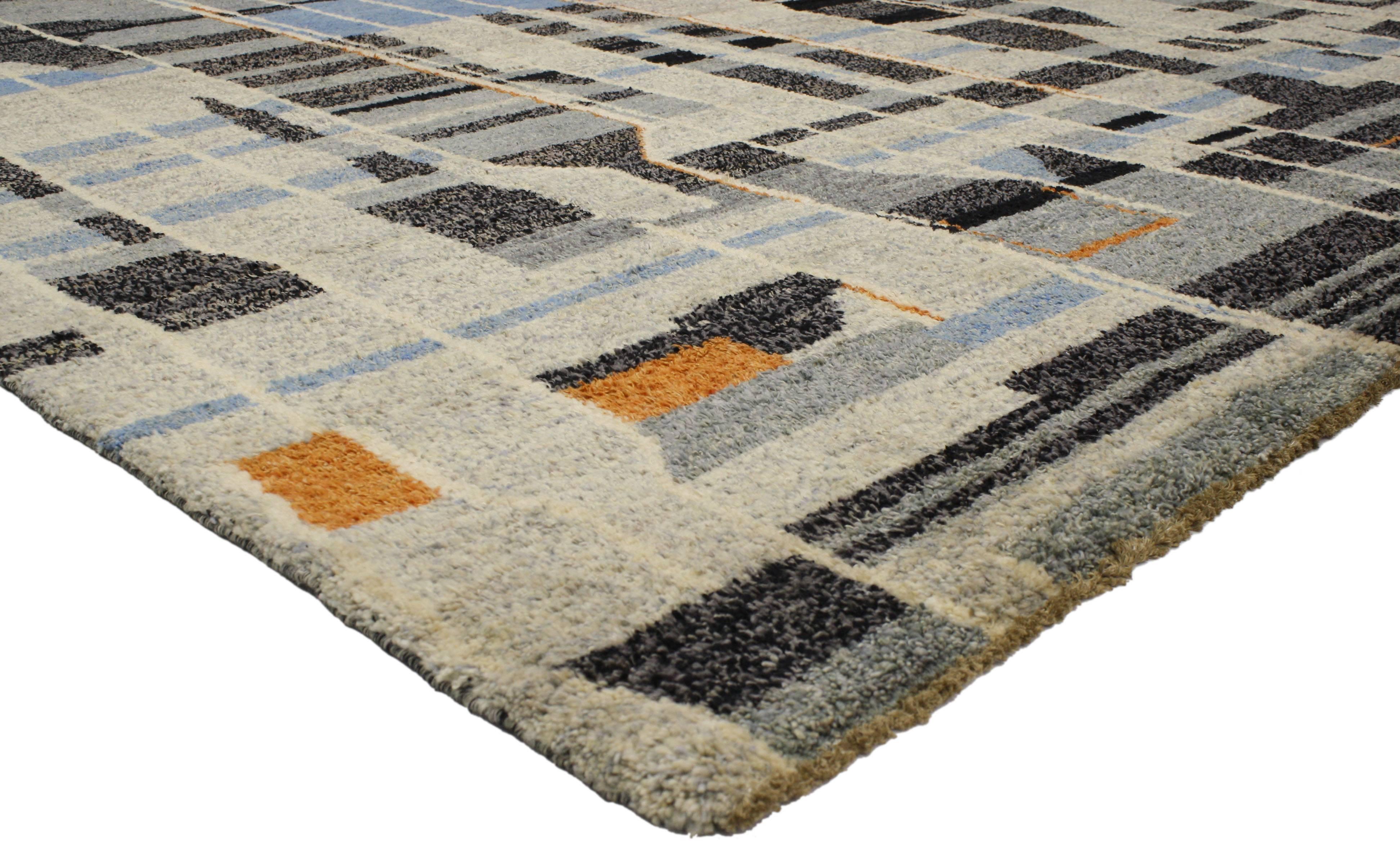 Highly stylish yet casually elegant, this contemporary Moroccan rug with modern design is ideal for nearly any fashionable space. A series of asymmetrical lines and color blocks create a mesmerizing optical effect over the entire composition. This