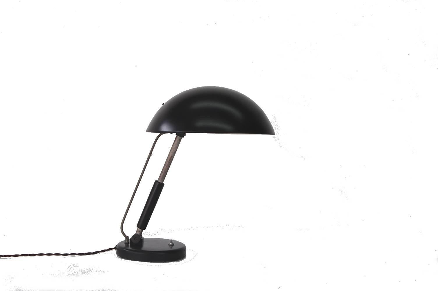 Karl Trabert desk lamp 1930 G. Schanzenbach & Co. Frankfurt a.M., Model 81126. Lamp's shade position is adjustable.

Completely rewired, including cloth covered cord.