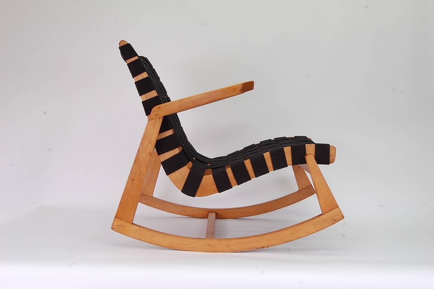 Rare rocking chair designed by Ralph Rapson (1914-2008) and manufactured by Knoll in 1945. Very rare, as it was only in production for one year. Completely restored, including new black cotton webbing.

Rapson studied at Cranbrook and later taught