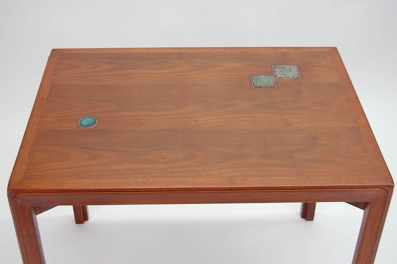 Occasional table in walnut with Natzler tiles, designed by Edward Wormley for Dunbar. From Dunbar's 