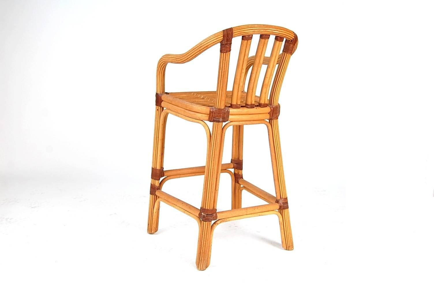 Set of Four Rattan and Leather Bar Stools by McGuire In Excellent Condition For Sale In Providence, RI