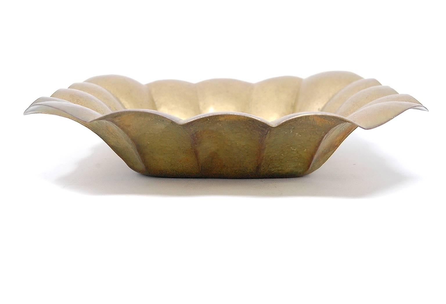 Rare brass low bowl by Albert Reimann. Fully signed.


* Free shipping at full price only.