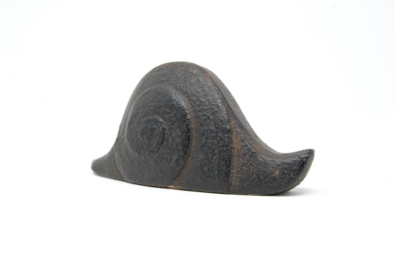 Cast iron snail. Origins unknown, but may be Japanese. Decorative object, but could be used as a paperweight.

We offer free delivery on most of our items within the long Island or greater NYC, Northern New Jersey, and New England areas. Please