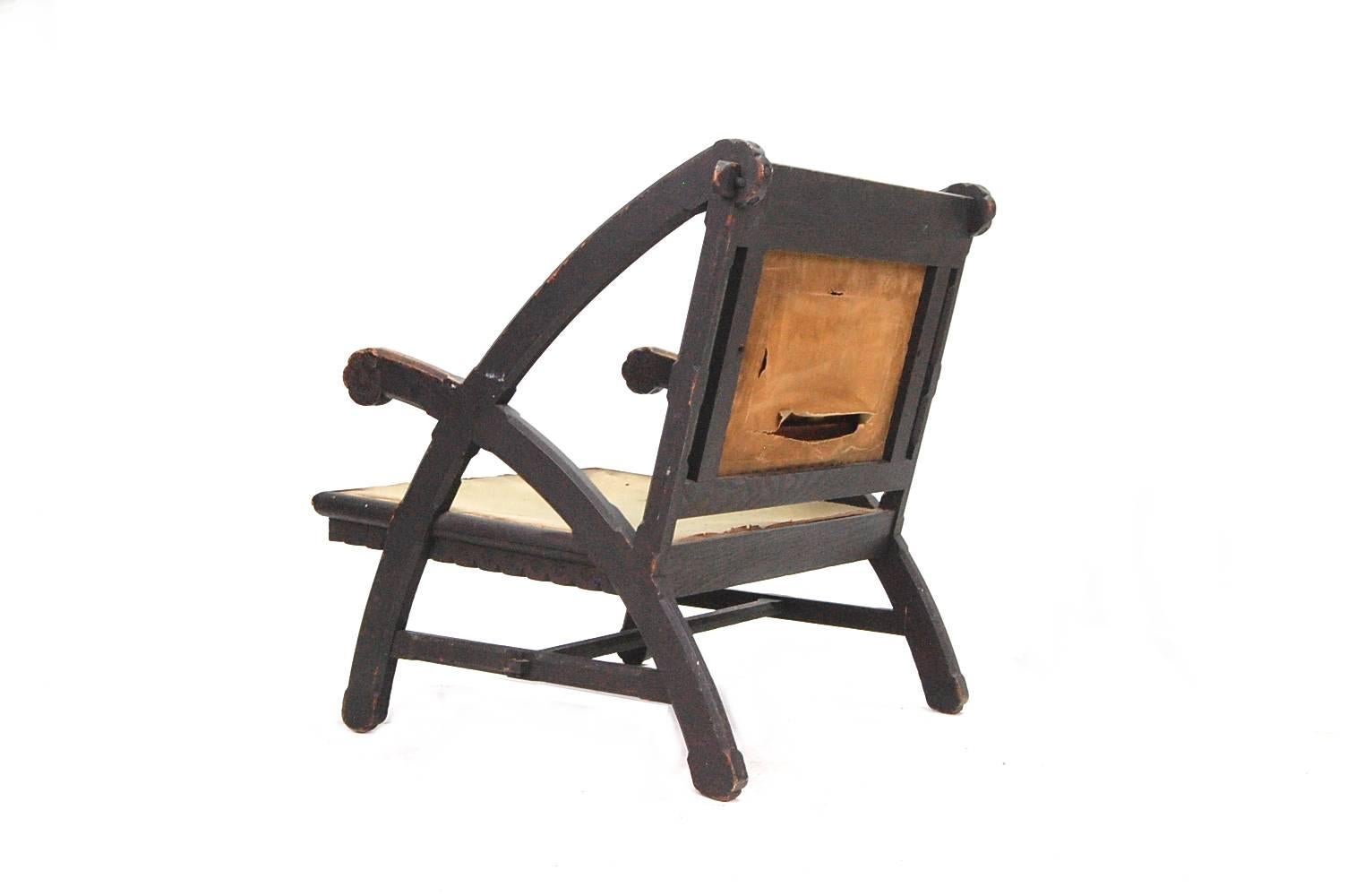 Exceedingly rare American Aesthetic Movement lounge chair designed by Architect Henry Hobson Richardson. This chair is based on the design that Richardson did for the Woburn, Massachusetts Public Library, circa 1876, and was most likely made by the