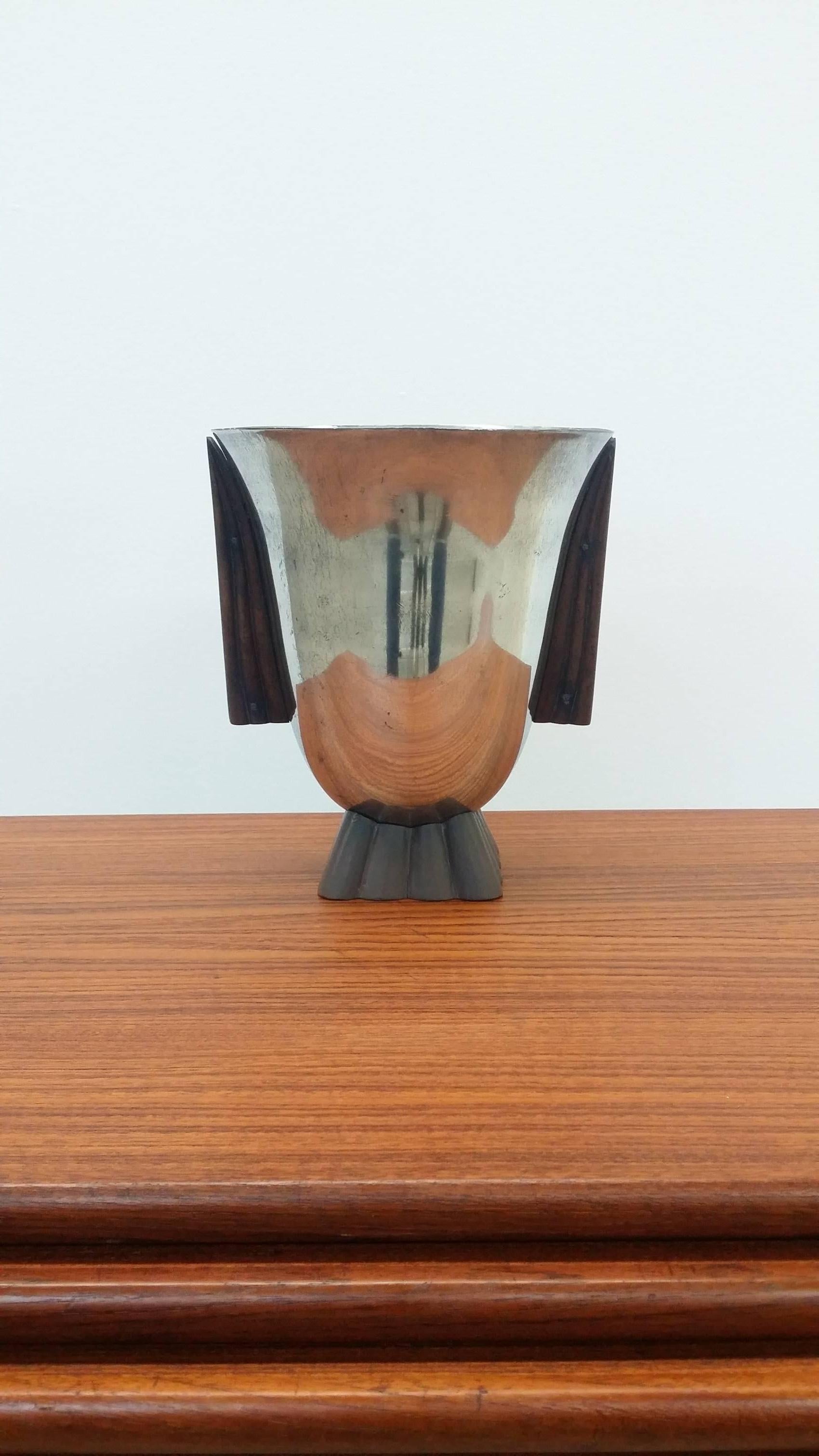 Handcrafted vessel in pewter and walnut by Connecticut craftsman Donn Jefferson sheets, circa 1936. Sheets was accepted into the Art Alliance of America in 1922. In the early 1930's, the AAA became the National Alliance of Art and Industry, and