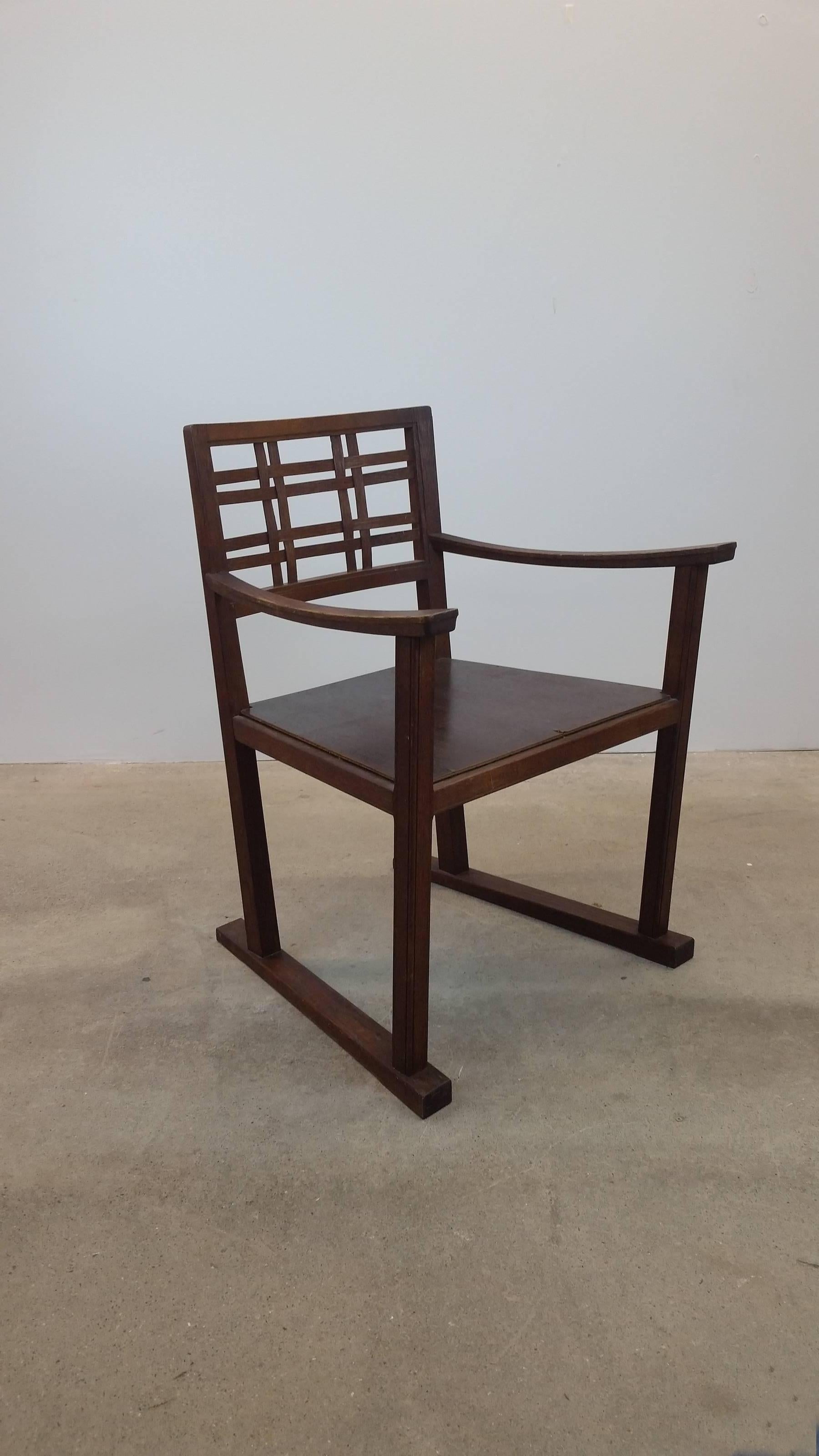 Scottish Art and Crafts chair, circa 1910. Clear Japanese influence noticeable, particularly in the arms. Constructed entirely of white oak. A beautifully designed and constructed chair. Seat will require a cushion.