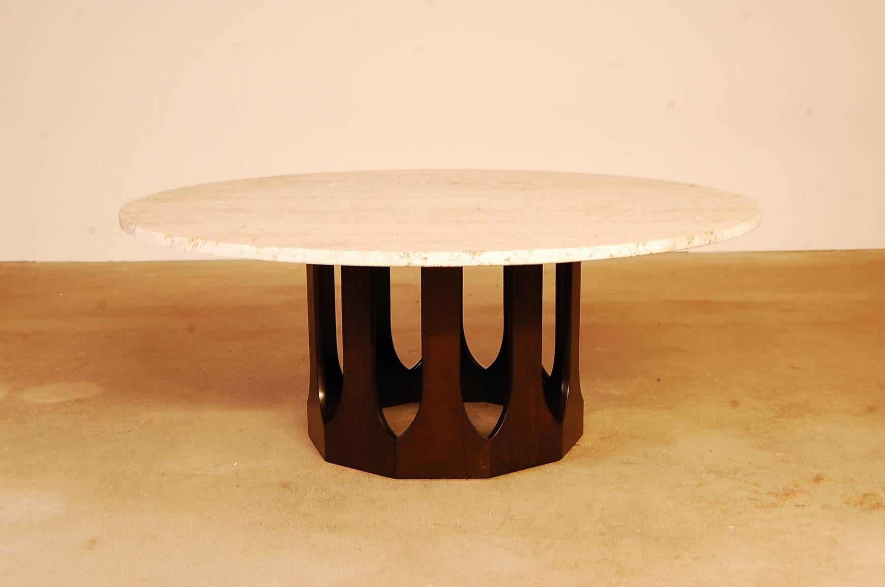 Round Harvey Probber travertine top coffee table, with a dark mahogany base, circa 1962. The diameter of the top is 48", and the table stands 19" tall. Beautiful figuring in the travertine.