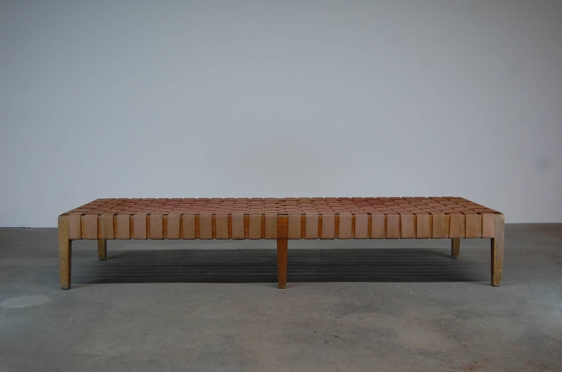 Organic design daybed in oak, with cotton webbing, circa 1945.