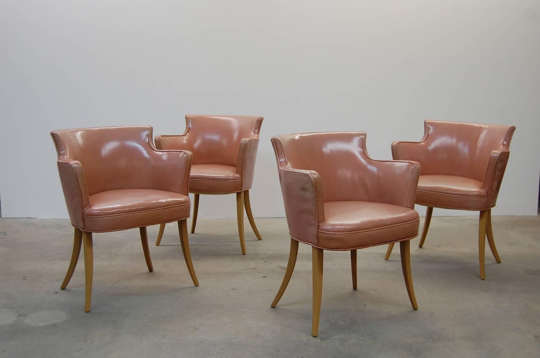 Set of four early Edward Wormley designed dining chairs, in original leather, circa 1945. Listing is for the set of four, but these would make wonderful occasional chairs, so would also sell in pairs. Price is for the set of four. Chairs measure 24